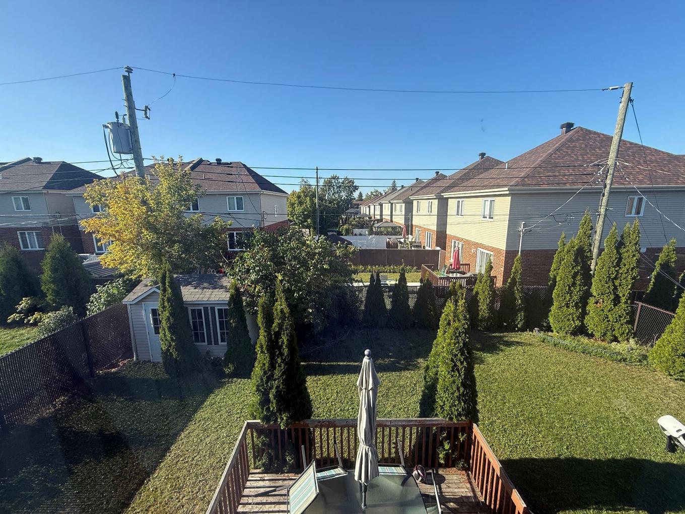 Backyard - 4946 Rue Évariste-Chaurette, Montréal (Pierrefonds-Roxboro), QC - Outdoor With Deck Patio Veranda