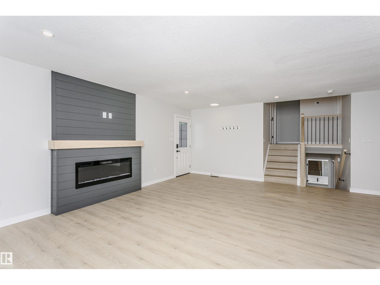 67 Lambert Cr, St. Albert, AB - Indoor Photo Showing Living Room With Fireplace