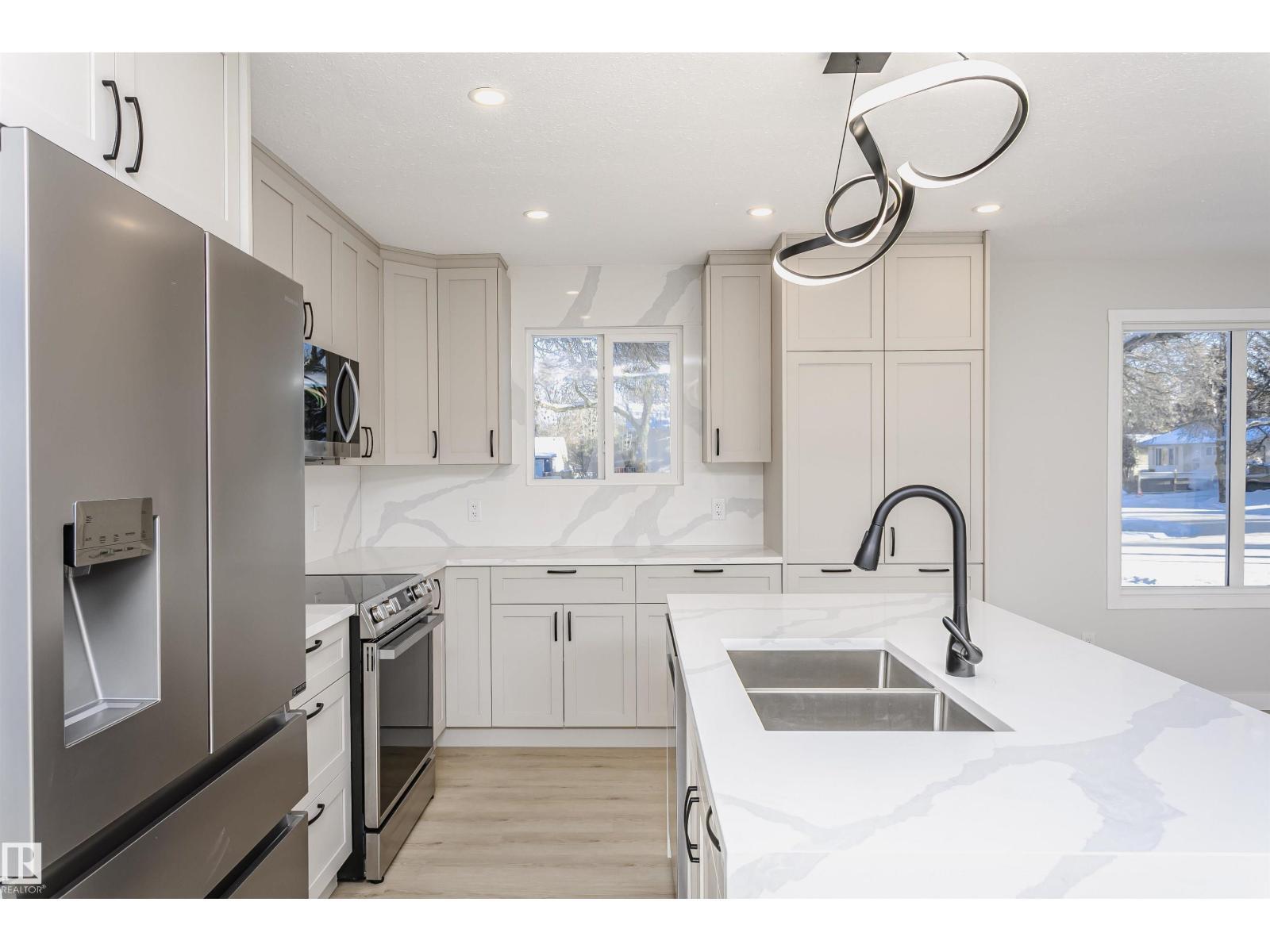 67 Lambert Cr, St. Albert, AB - Indoor Photo Showing Kitchen With Double Sink With Upgraded Kitchen
