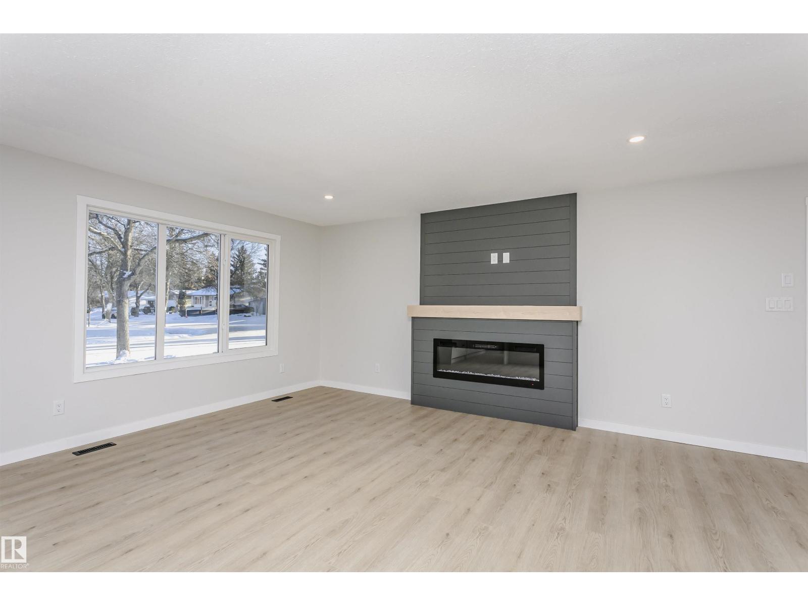67 Lambert Cr, St. Albert, AB - Indoor Photo Showing Living Room With Fireplace