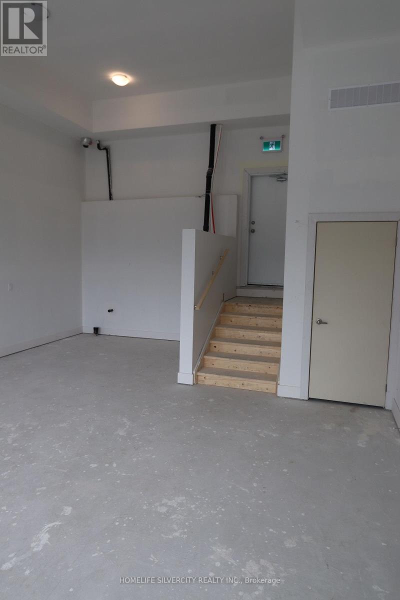 Commercial unit to be leased separately - 142 Falby Rd Road, Brampton, ON - Indoor Photo Showing Garage