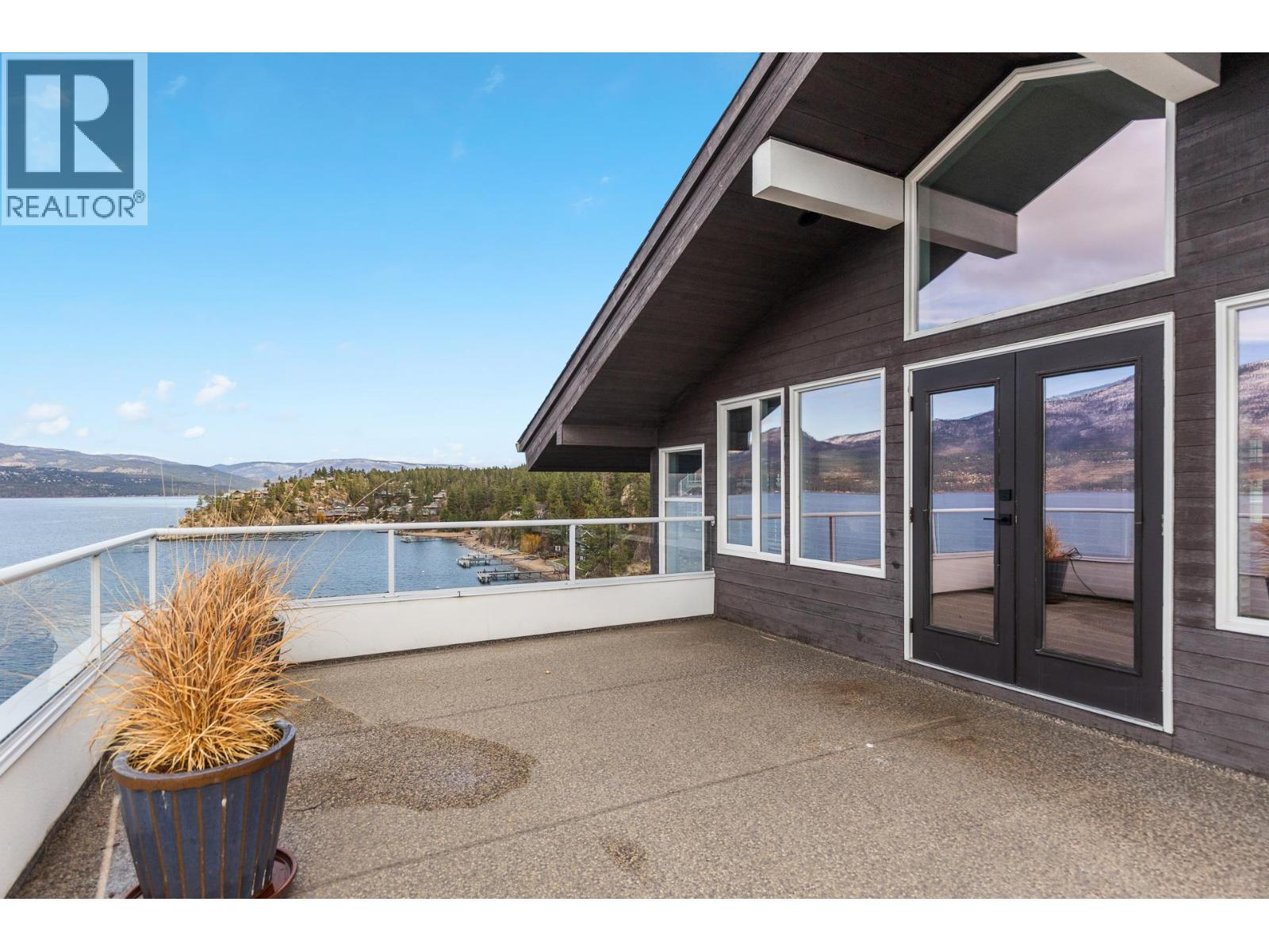 Primary Suite Balcony - 9900 Eastside Road Unit# 3, Vernon, BC - Outdoor With Body Of Water With Exterior
