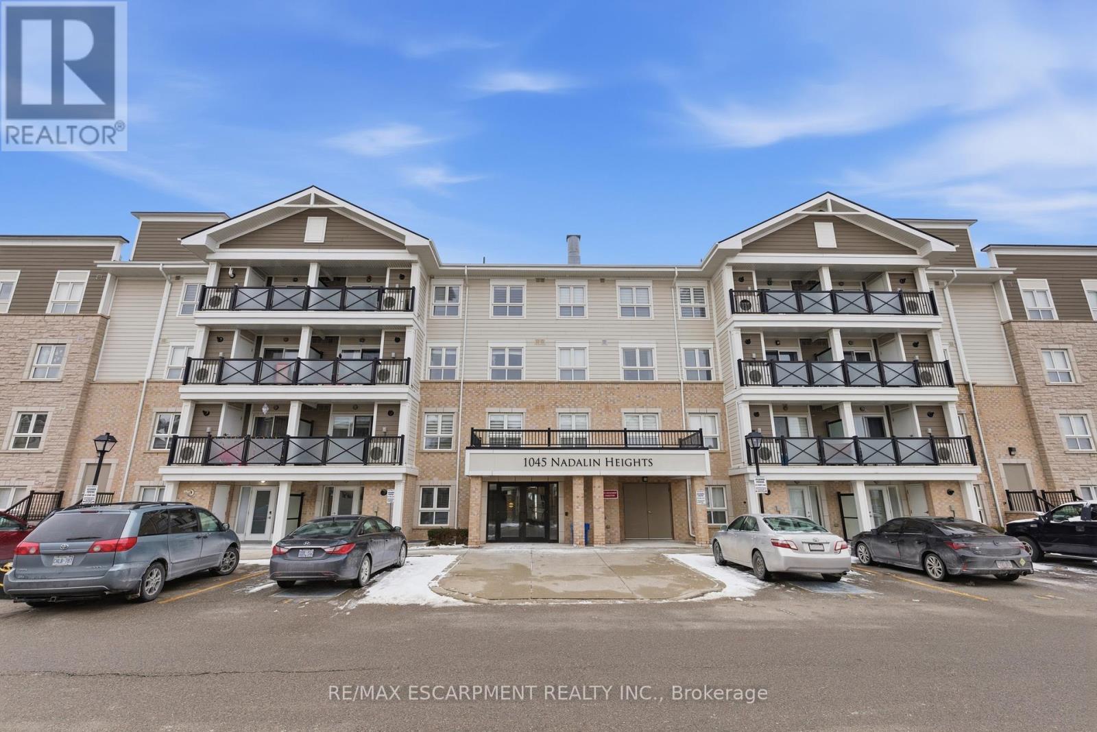 107 - 1045 Nadalin Heights, Milton, ON - Outdoor With Facade