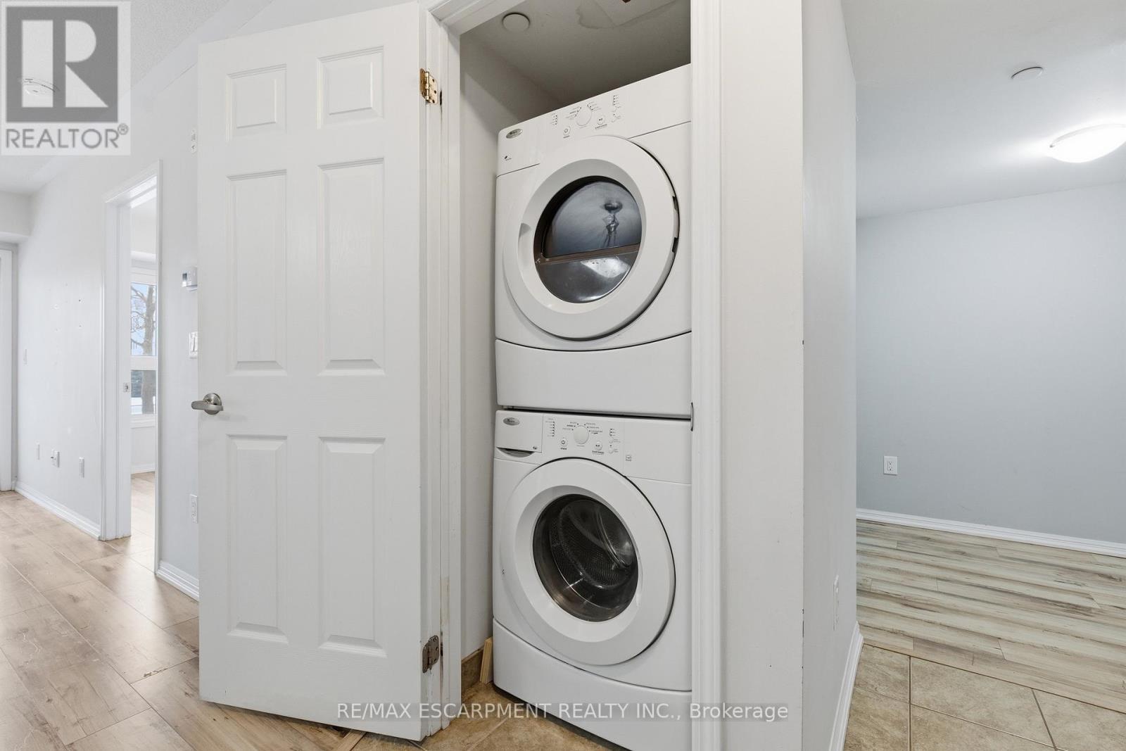 In-suite Laundry - 107 - 1045 Nadalin Heights, Milton, ON - Indoor Photo Showing Laundry Room