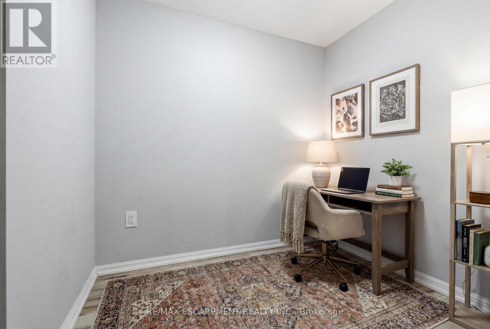 Den (virtually staged) - 107 - 1045 Nadalin Heights, Milton, ON - Indoor Photo Showing Office