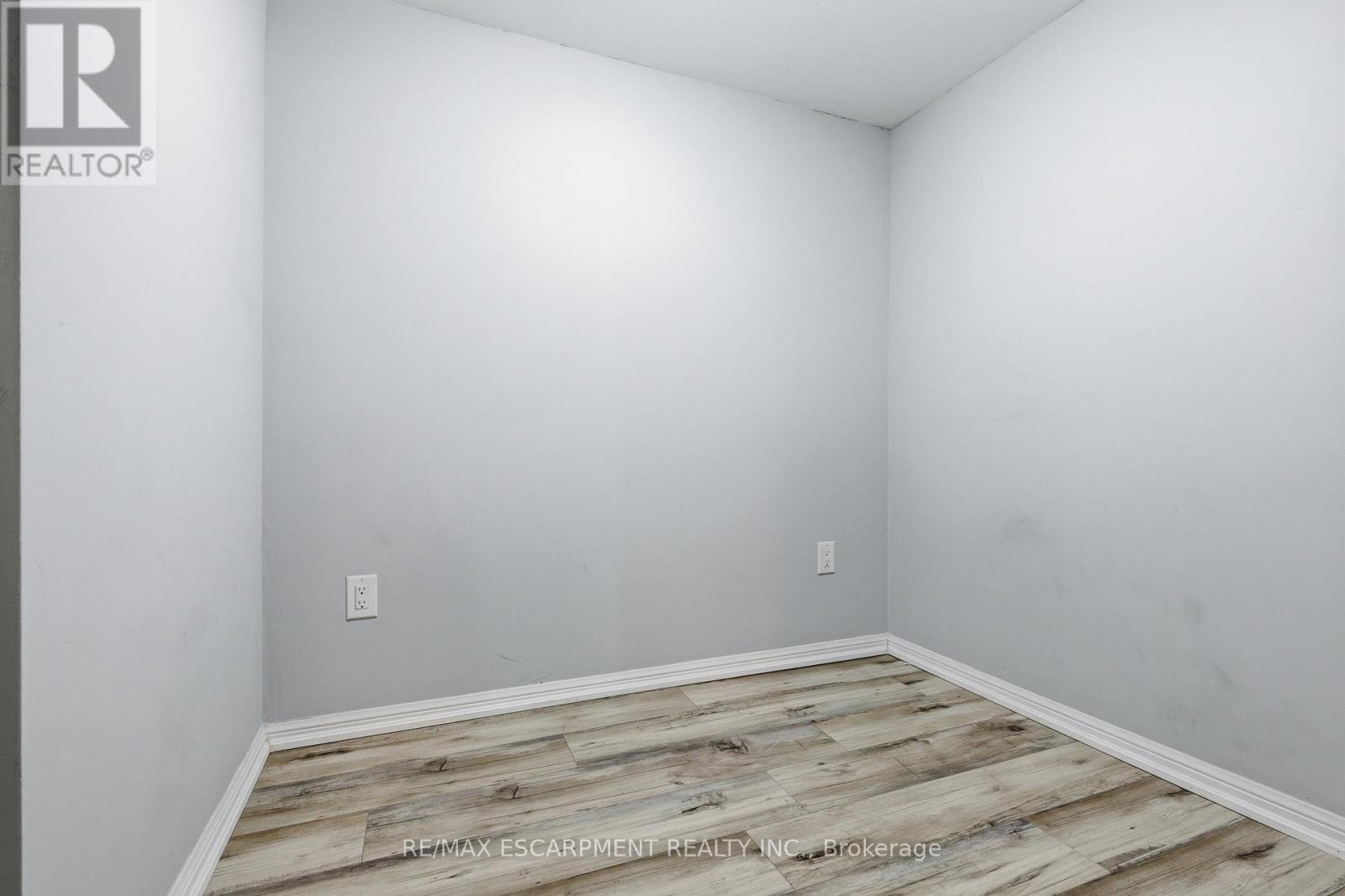 Den - 107 - 1045 Nadalin Heights, Milton, ON - Indoor Photo Showing Other Room