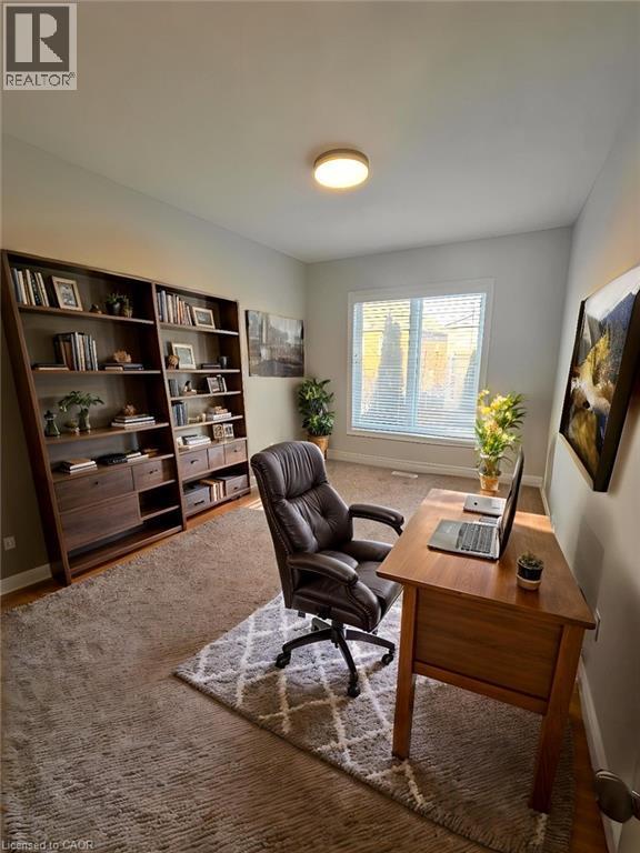 Home office with baseboards - 93 Tremaine Drive, Kitchener, ON - Indoor Photo Showing Living Room