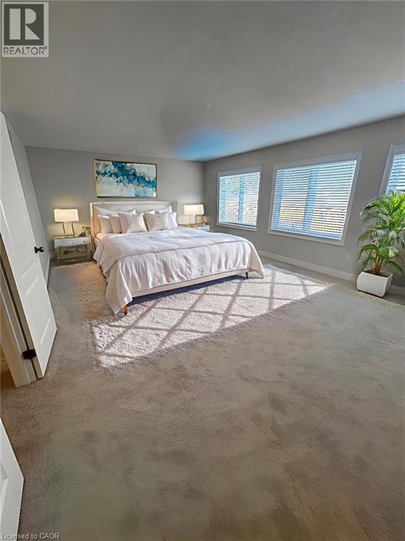 Bedroom with carpet floors and baseboards - 93 Tremaine Drive, Kitchener, ON - Indoor Photo Showing Bedroom