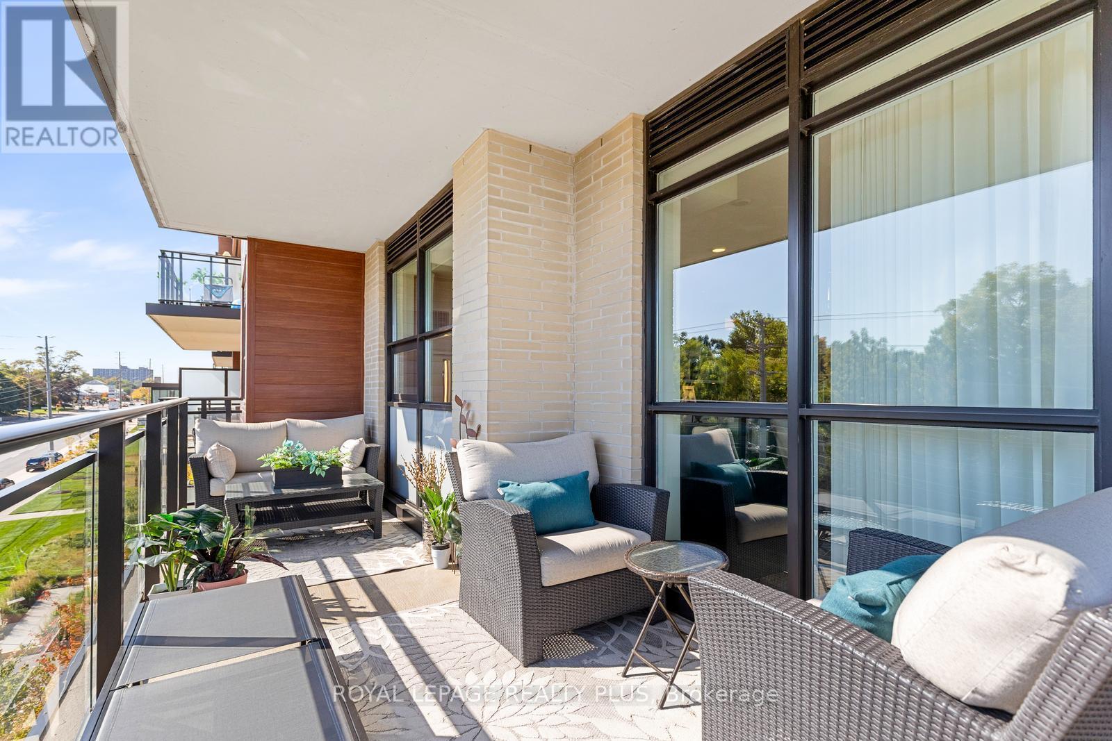 327 - 1575 Lakeshore Road W, Mississauga, ON - Outdoor With Balcony With Exterior