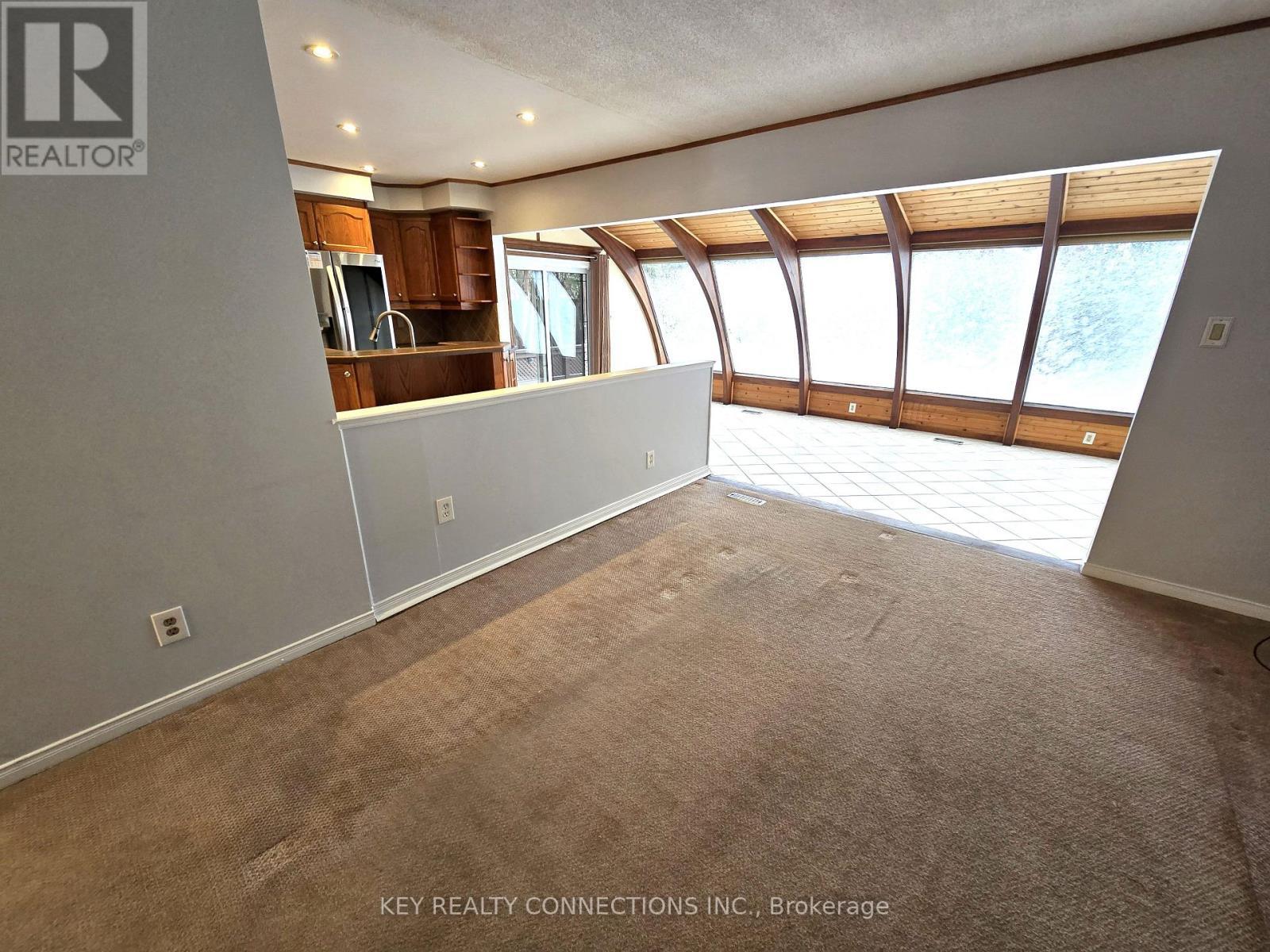 Family room, sunroom & kitchen - 2425 Headon Forest Drive, Burlington, ON - Indoor Photo Showing Other Room