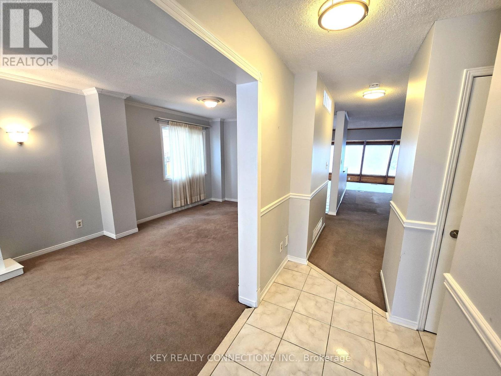 Foyer & living room - 2425 Headon Forest Drive, Burlington, ON - Indoor Photo Showing Other Room
