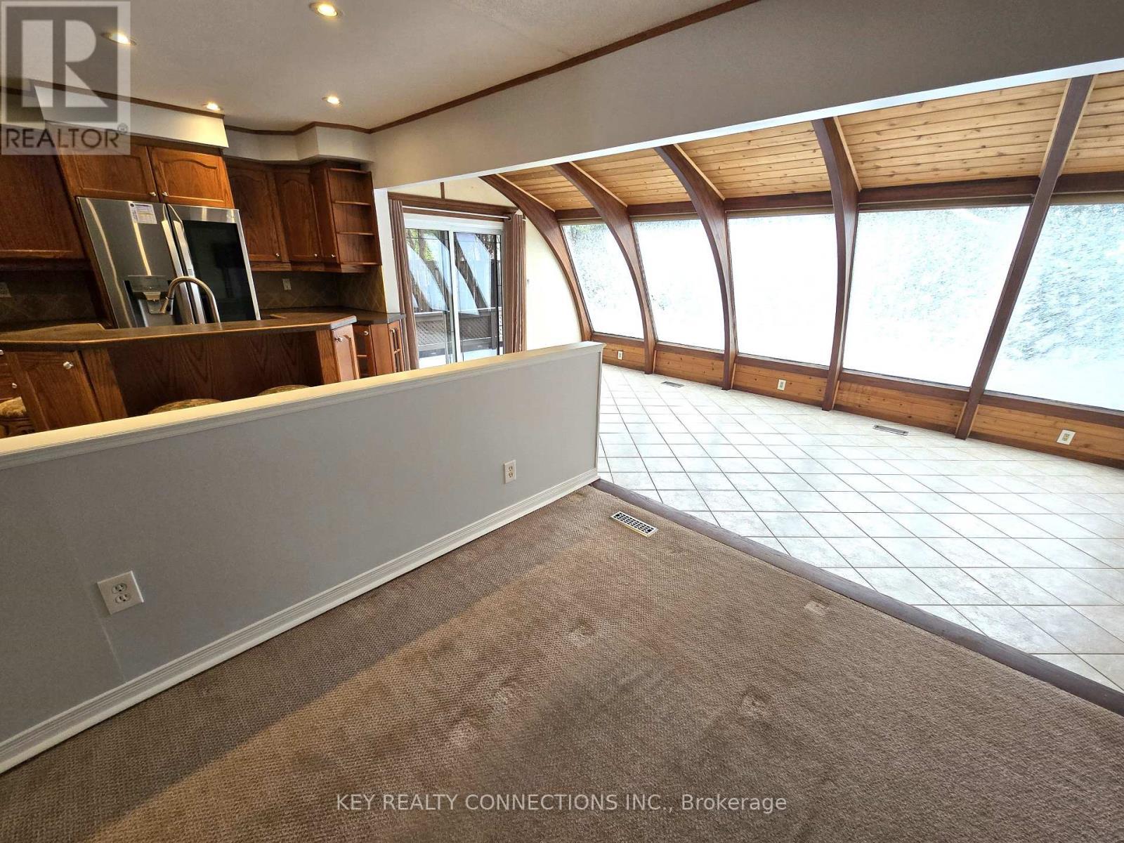 Family room, sunroom & kitchen - 2425 Headon Forest Drive, Burlington, ON - Indoor Photo Showing Other Room