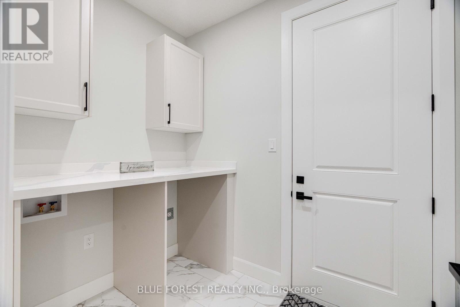 Main Floor Laundry - 303 Nancy Street, Dutton/Dunwich, ON - Indoor Photo Showing Other Room
