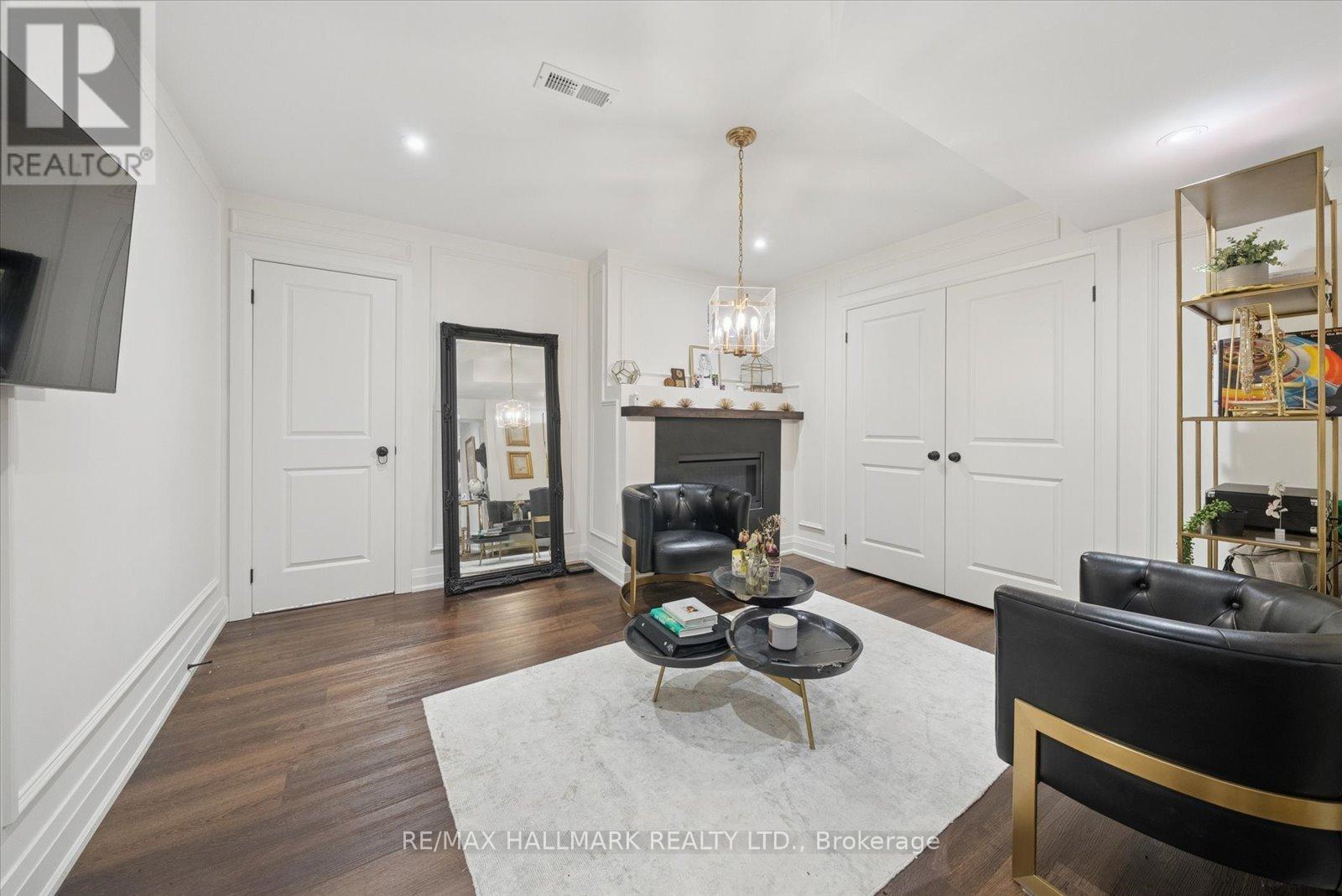 Basement - 312 Main Unionville Street, Markham, ON - Indoor Photo Showing Living Room With Fireplace