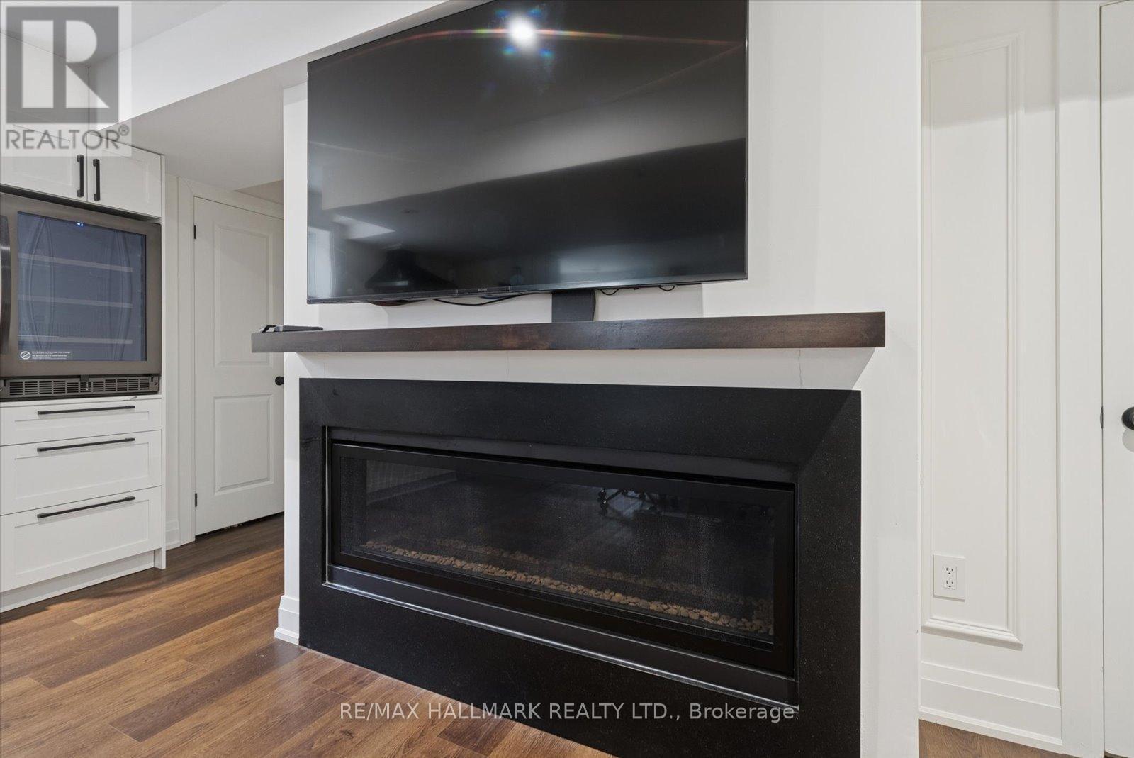 Basement - 312 Main Unionville Street, Markham, ON - Indoor Photo Showing Living Room With Fireplace