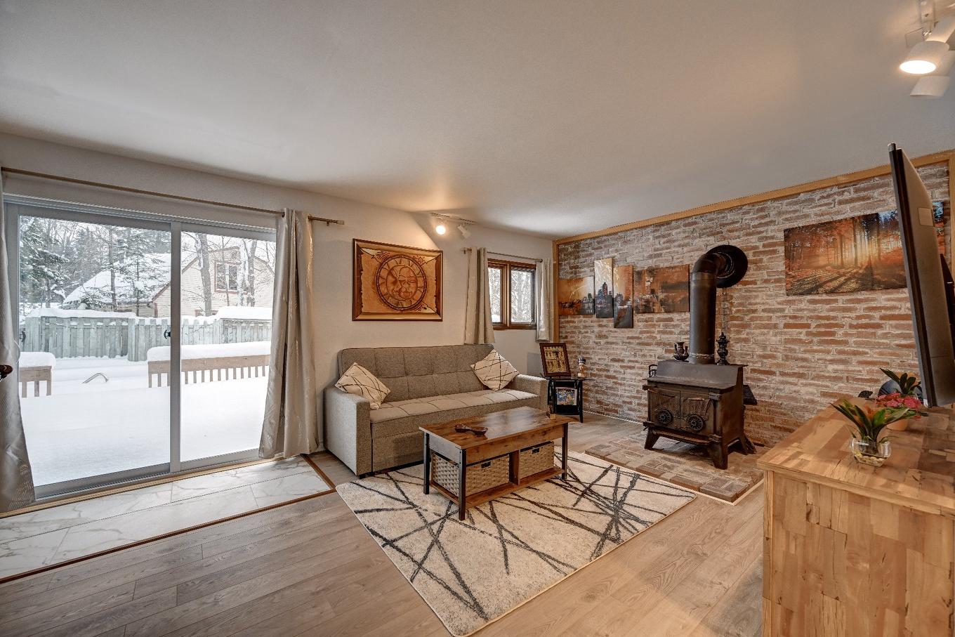 Living room - 3770 Mtée D'Argenteuil, Saint-Adolphe-D'Howard, QC - Indoor Photo Showing Living Room With Fireplace