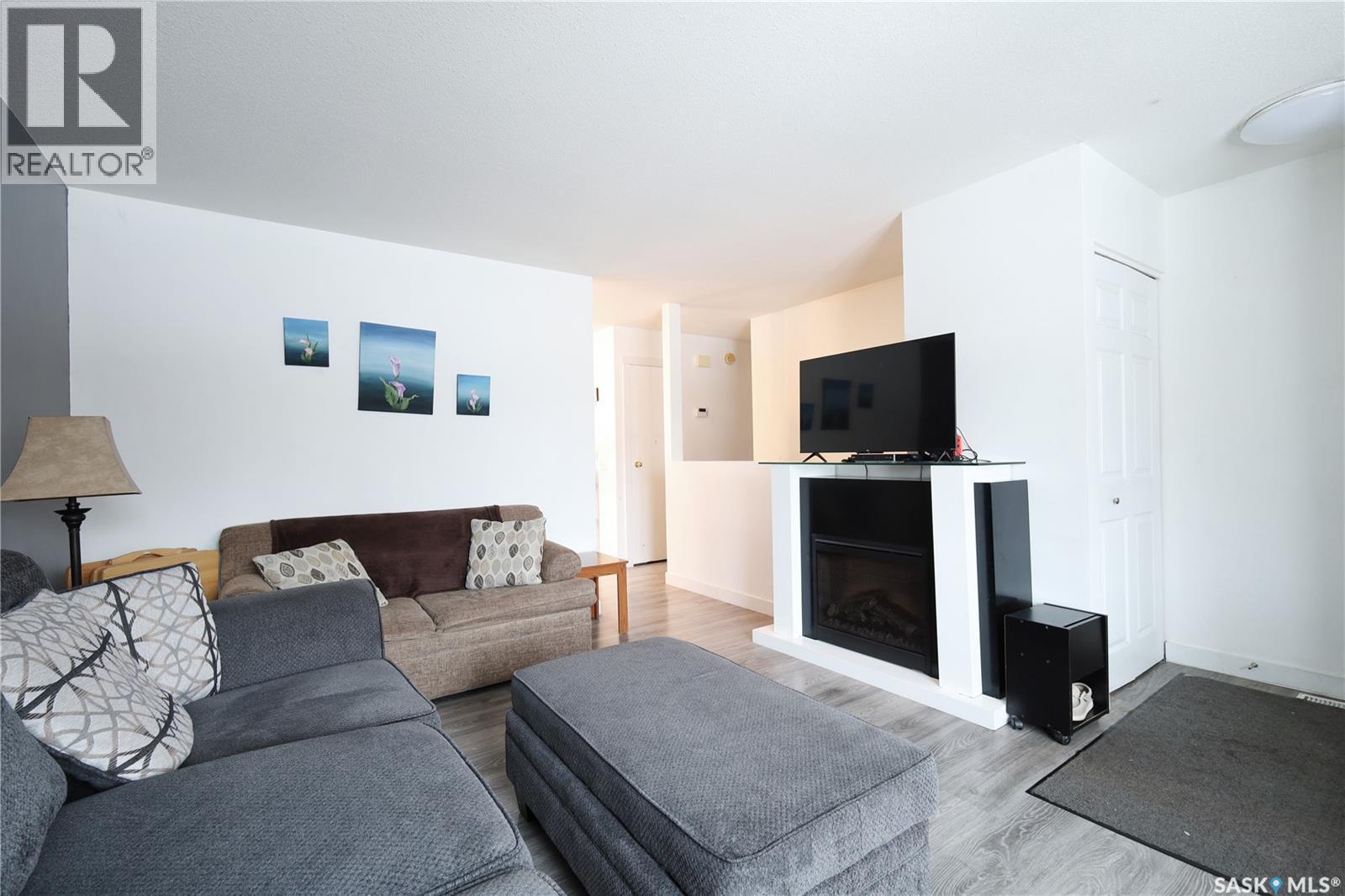 313 Centennial Boulevard, Warman, SK - Indoor Photo Showing Living Room With Fireplace