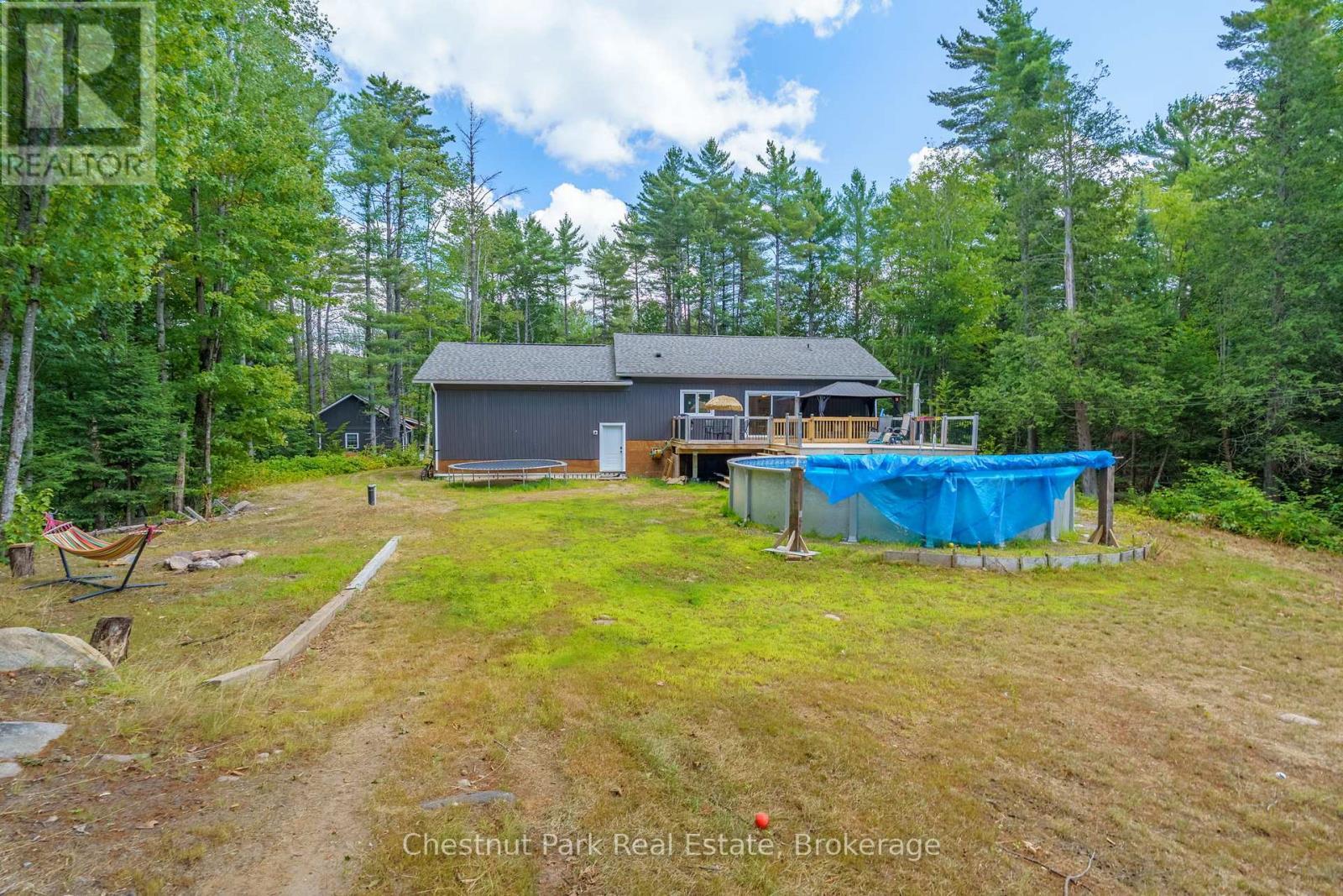 2698 Old Muskoka Road, Huntsville (Stephenson), ON - Outdoor With Above Ground Pool With Backyard