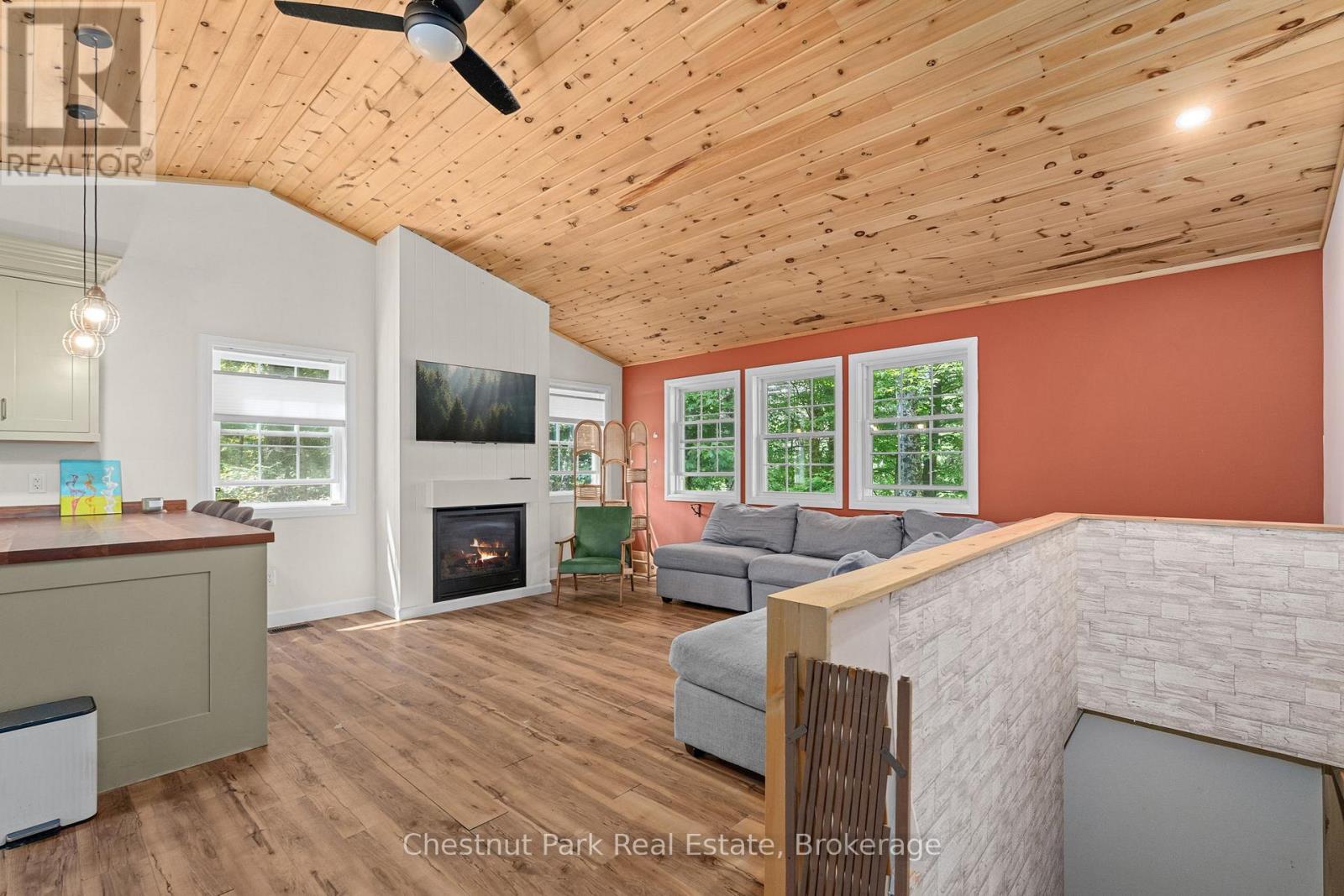 Interior of Second House - 2698 Old Muskoka Road, Huntsville (Stephenson), ON - Indoor Photo Showing Living Room With Fireplace