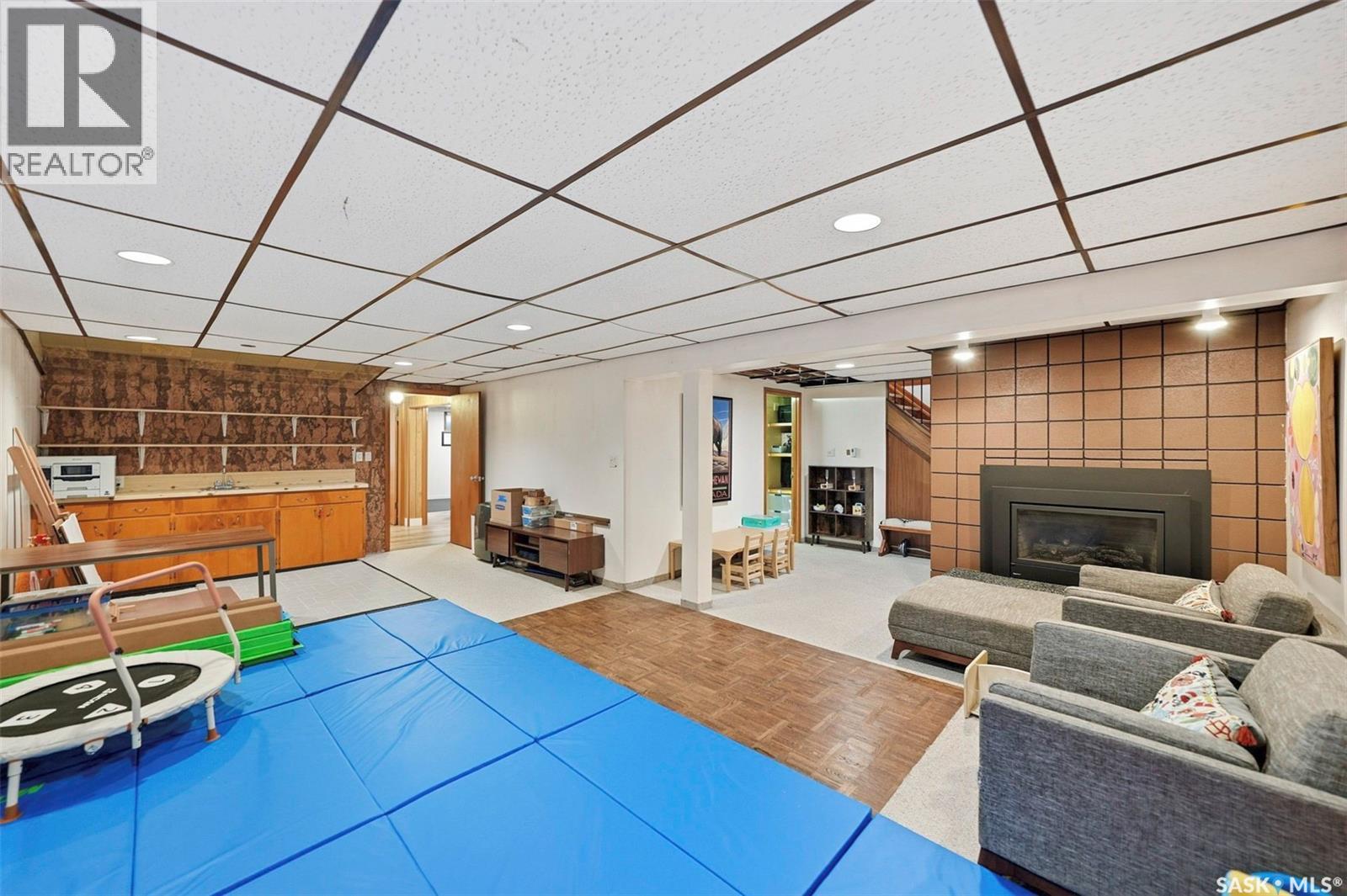 14 Yale Crescent, Saskatoon, SK - Indoor Photo Showing Other Room With Fireplace