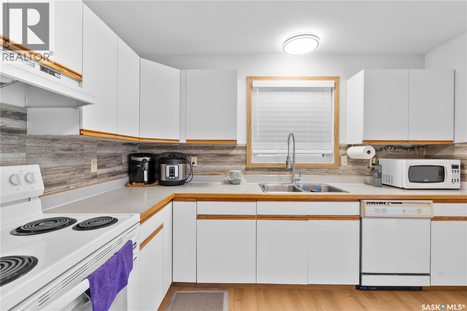 214-A Grant Street, Saskatoon, SK - Indoor Photo Showing Kitchen With Double Sink