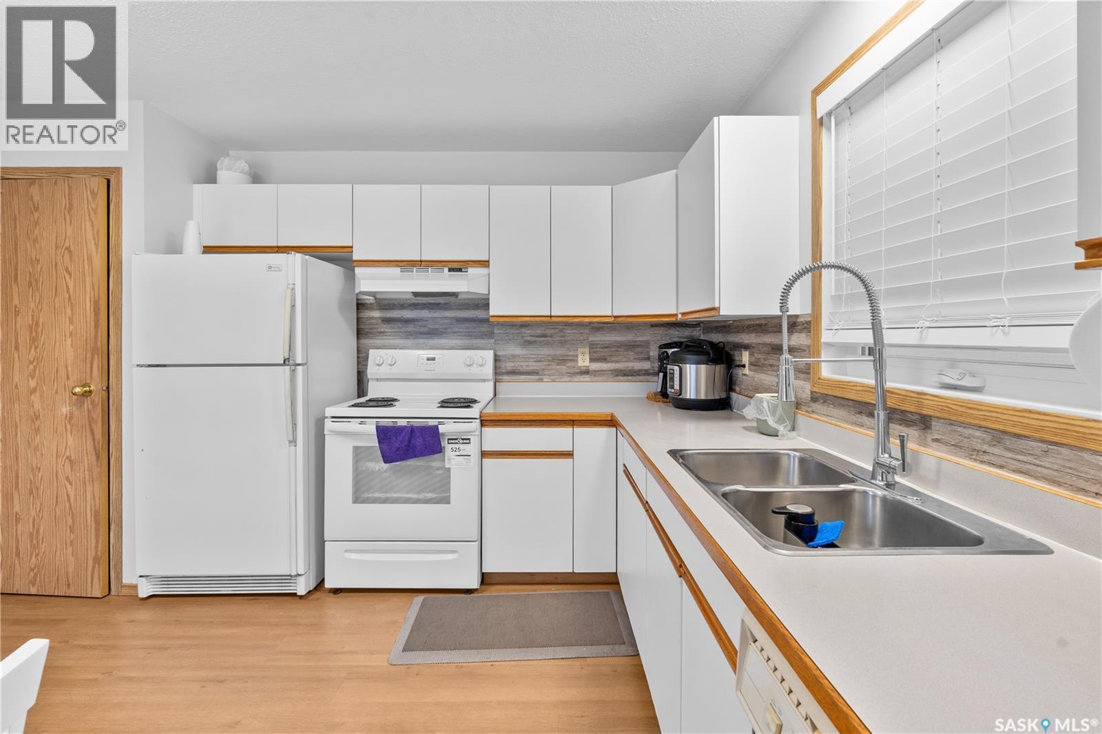 214-A Grant Street, Saskatoon, SK - Indoor Photo Showing Kitchen With Double Sink