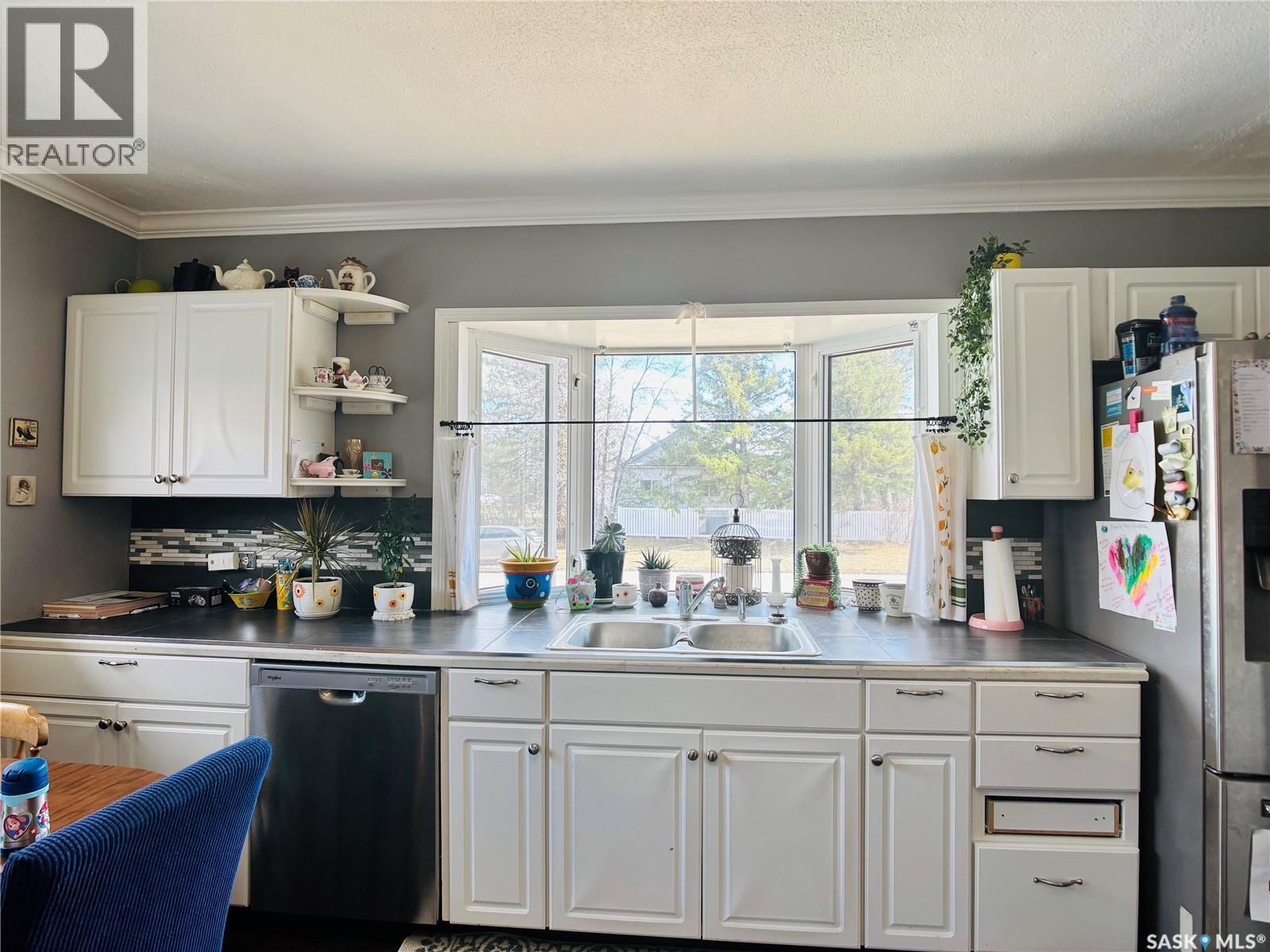 208 Forget Street, Stoughton, SK - Indoor Photo Showing Kitchen With Double Sink