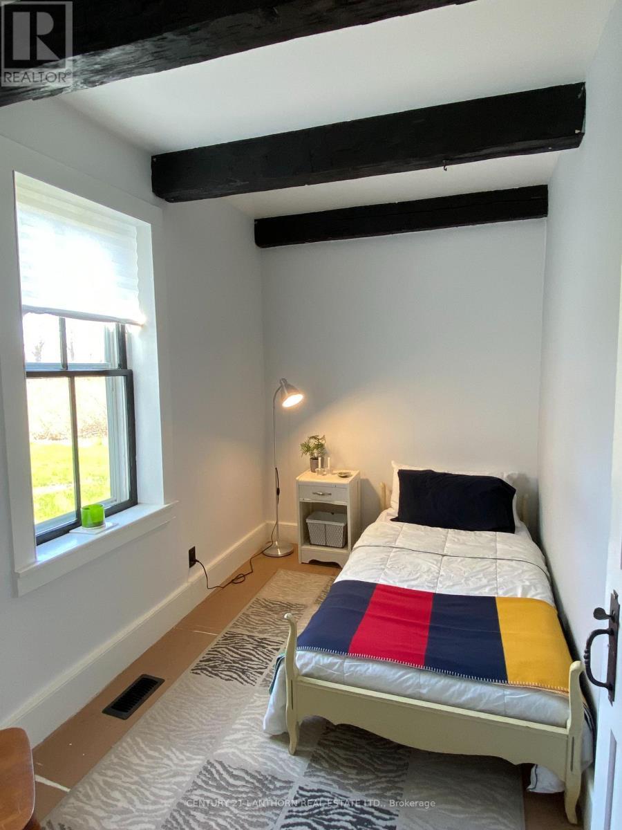 2nd bedroom on main level - 644 County 10 Road, Prince Edward County (Hallowell Ward), ON - Indoor Photo Showing Bedroom