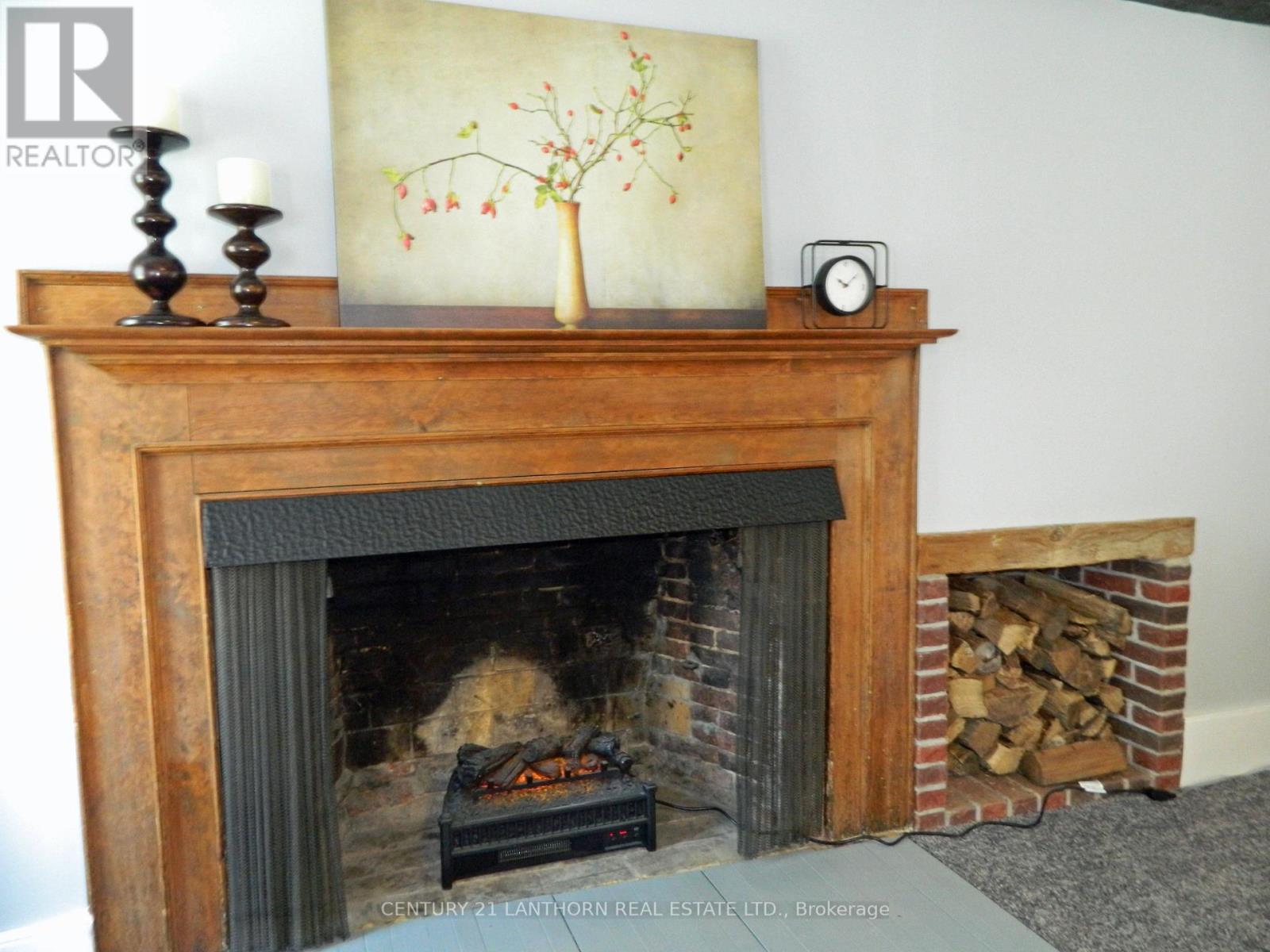 Fireplace with insert - 644 County 10 Road, Prince Edward County (Hallowell Ward), ON - Indoor Photo Showing Living Room With Fireplace