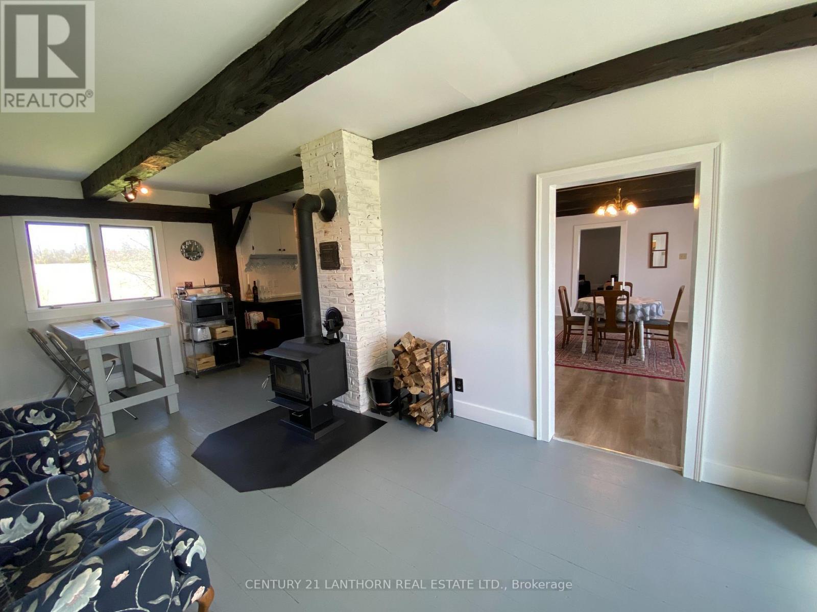 View of dining room from kitchen/sitting area - 644 County 10 Road, Prince Edward County (Hallowell Ward), ON - Photo Showing Other Room