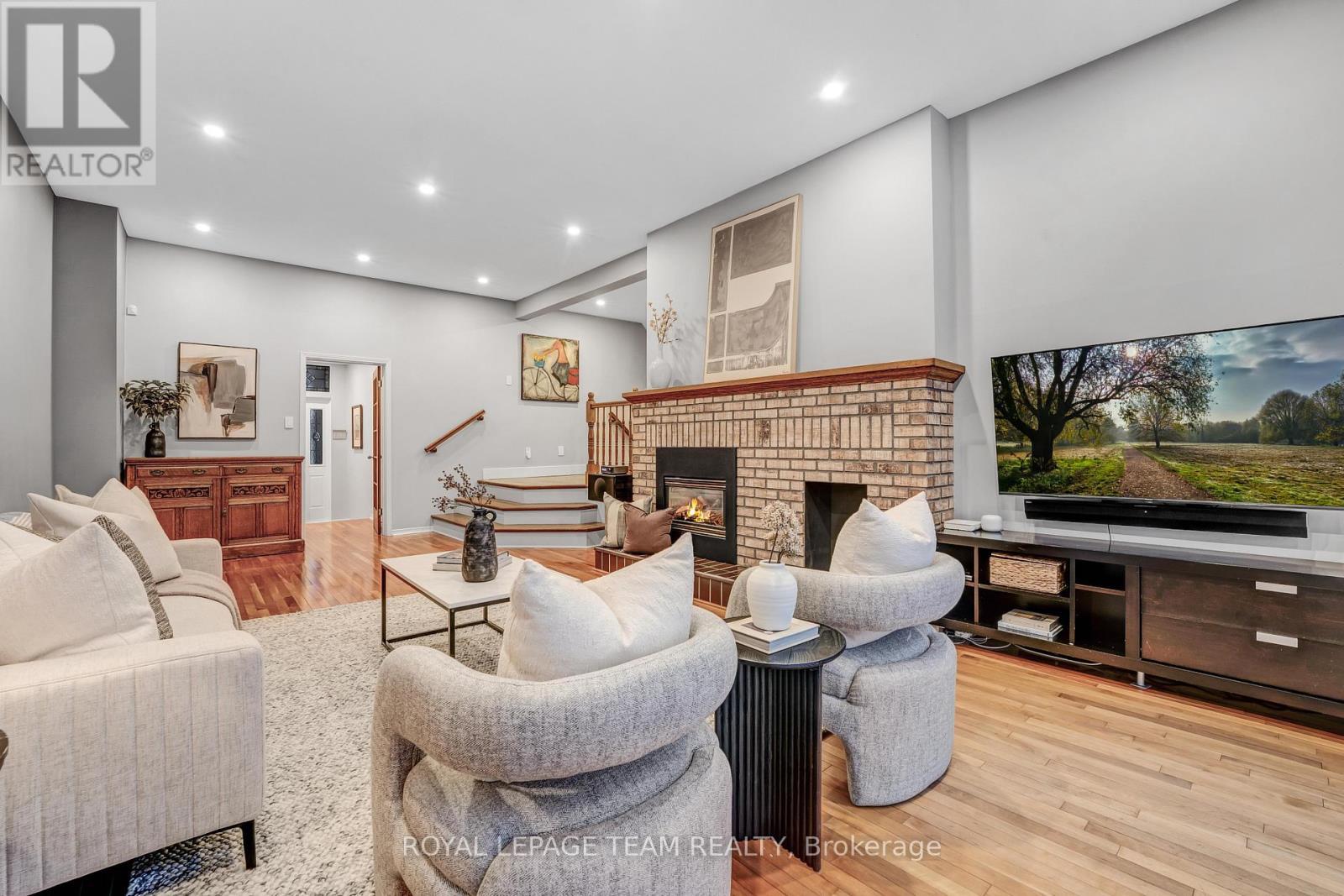 3831 Autumnwood Street, Ottawa, ON - Indoor Photo Showing Living Room With Fireplace