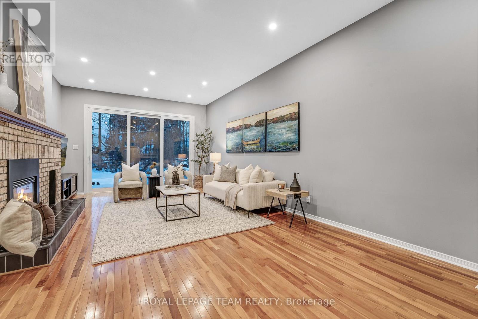 3831 Autumnwood Street, Ottawa, ON - Indoor With Fireplace