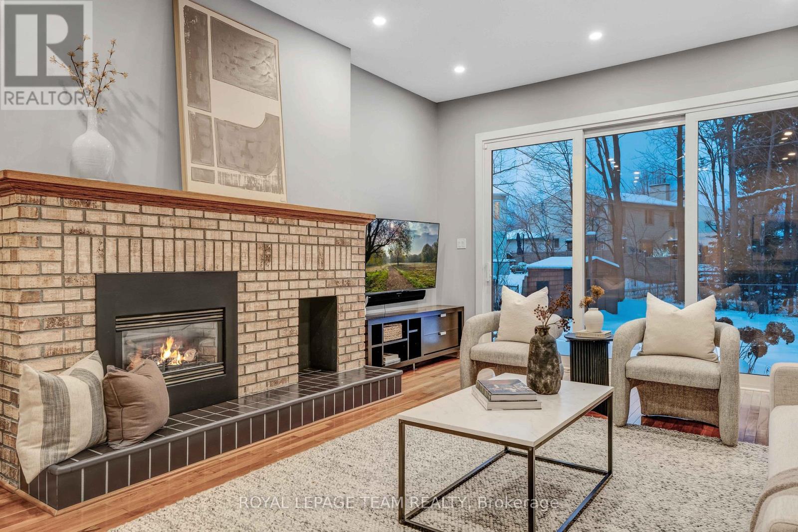 3831 Autumnwood Street, Ottawa, ON - Indoor Photo Showing Living Room With Fireplace