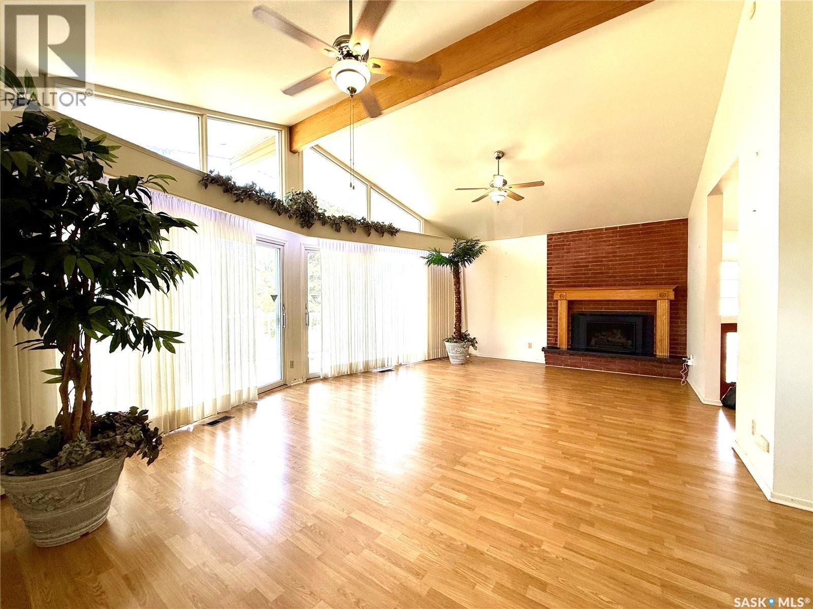 7 Driftwood Crescent, Yorkton, SK - Indoor Photo Showing Living Room With Fireplace