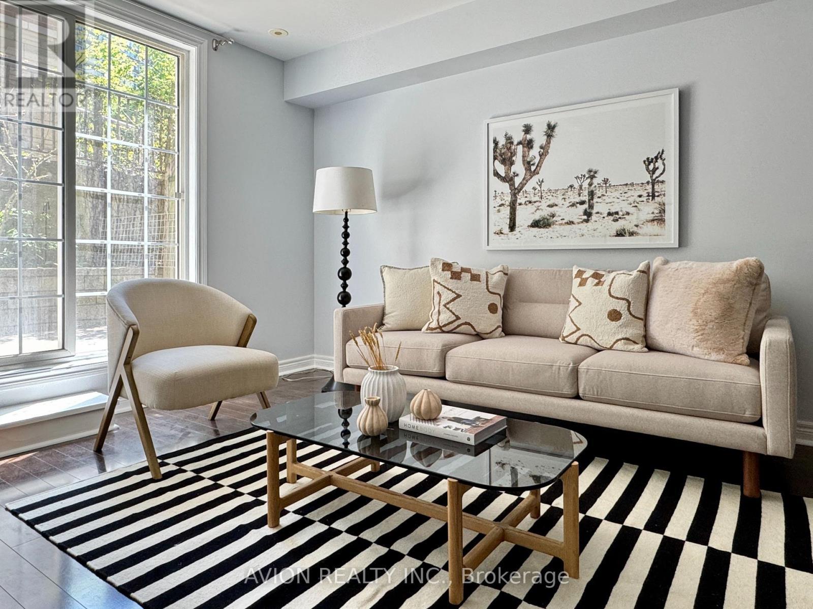 11 - 45 Cedarcroft Boulevard, Toronto, ON - Indoor Photo Showing Living Room