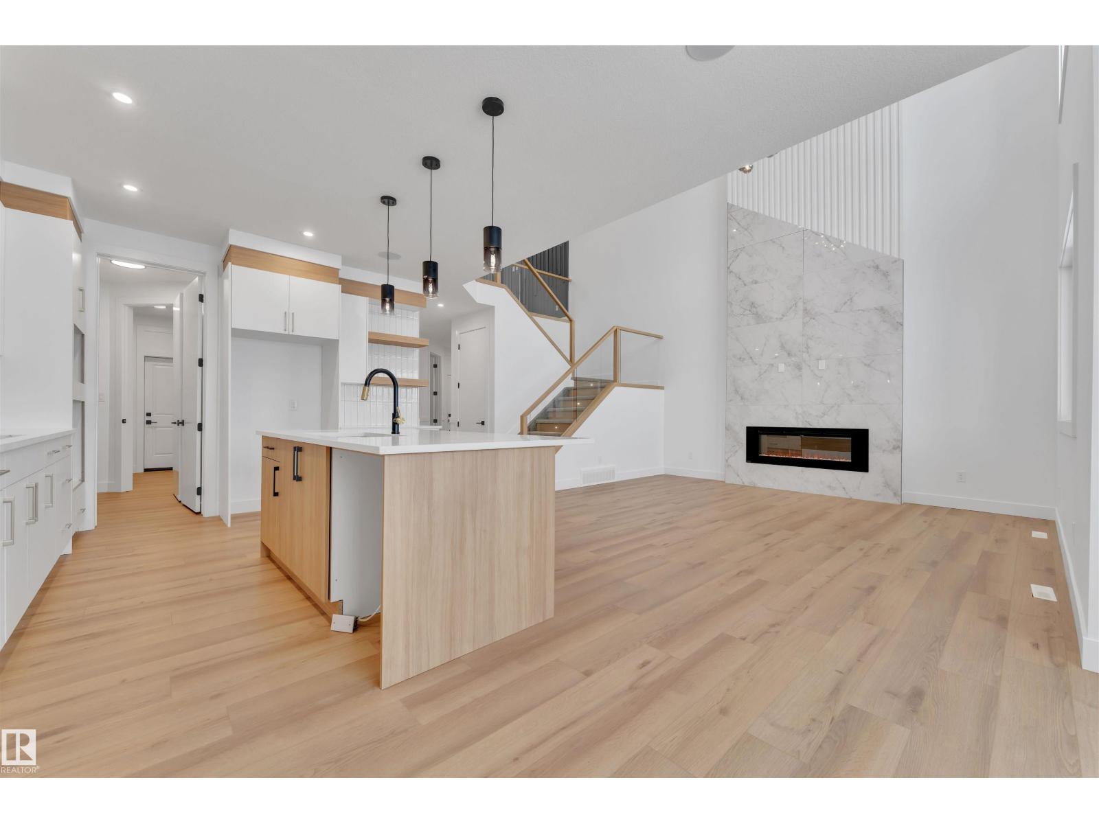 744 Astoria Wy, Devon, AB - Indoor Photo Showing Other Room With Fireplace