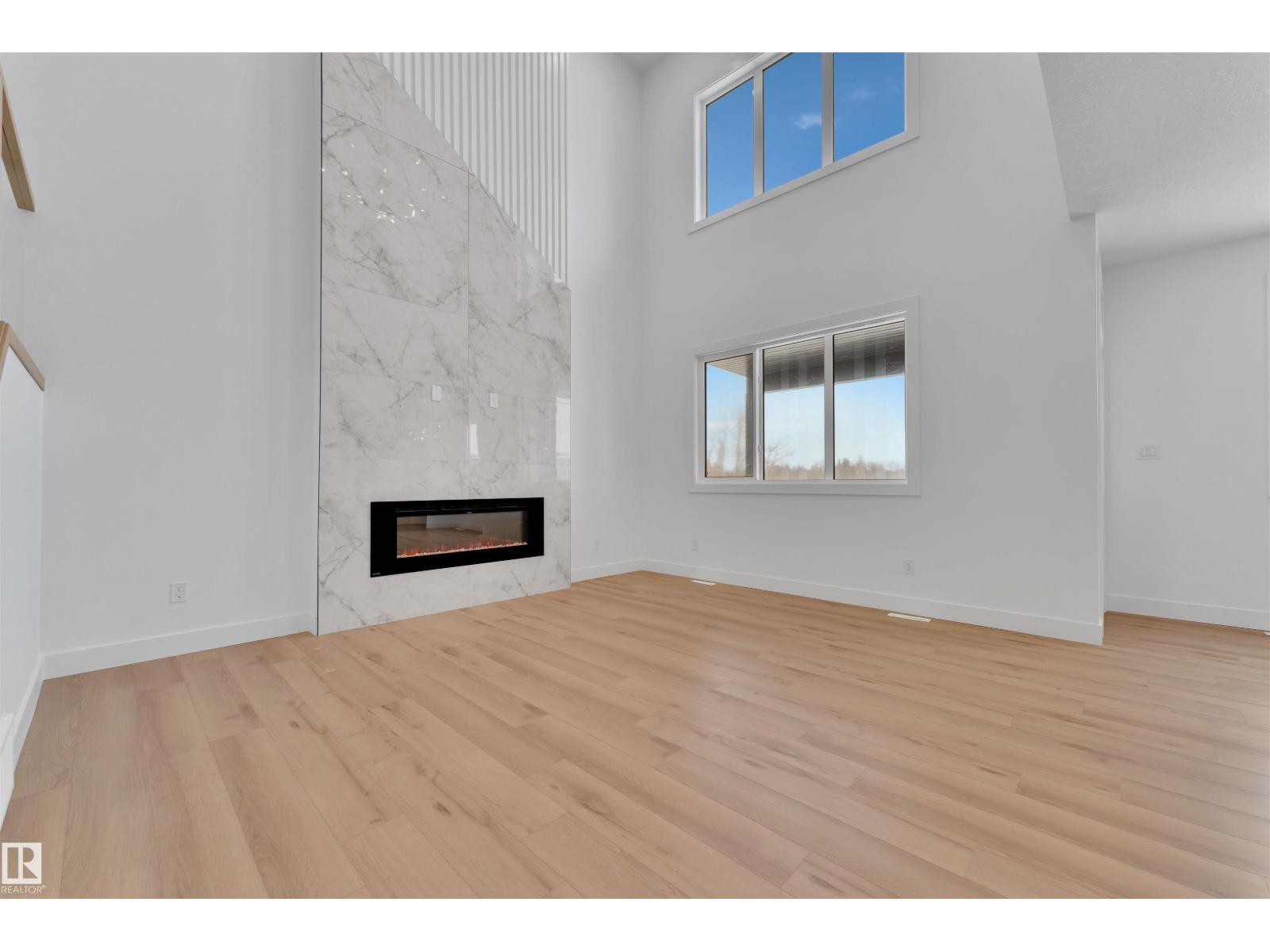 744 Astoria Wy, Devon, AB - Indoor With Fireplace