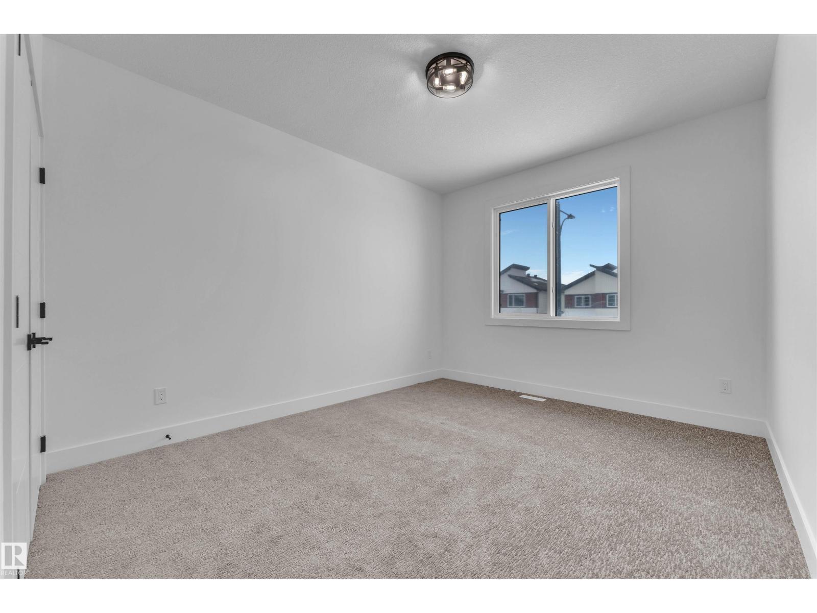 744 Astoria Wy, Devon, AB - Indoor Photo Showing Other Room