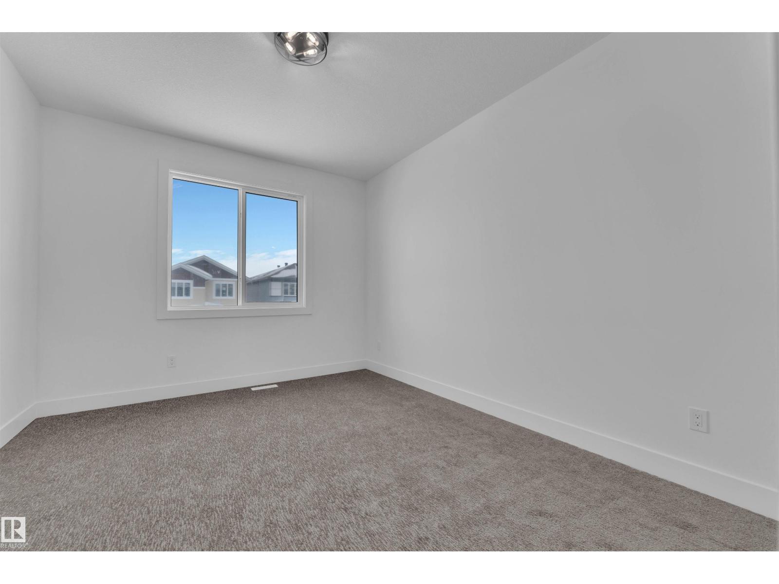 744 Astoria Wy, Devon, AB - Indoor Photo Showing Other Room