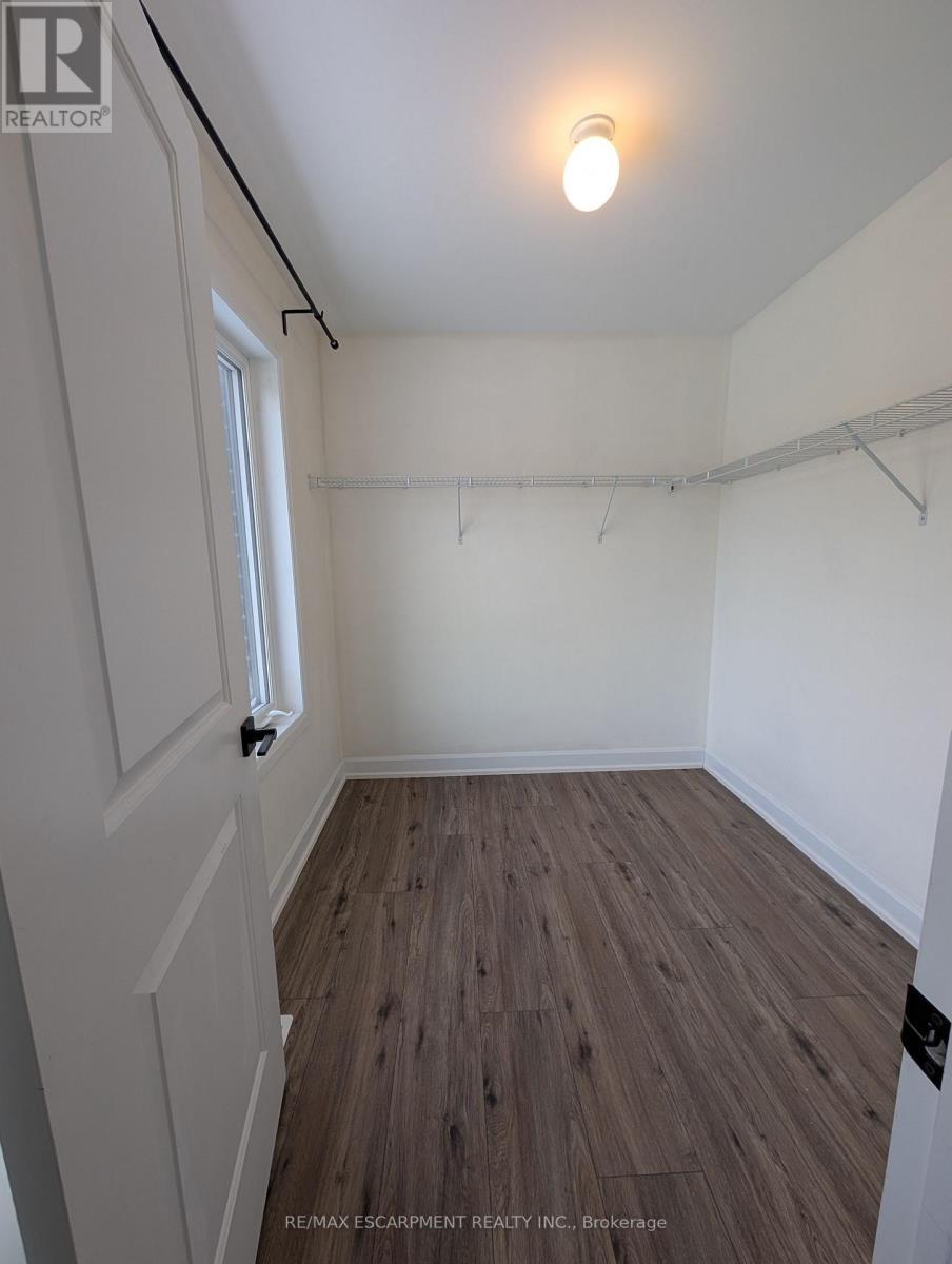 Walk-In Closet Primary Bedroom - 55 Southam Lane, Hamilton, ON - Indoor