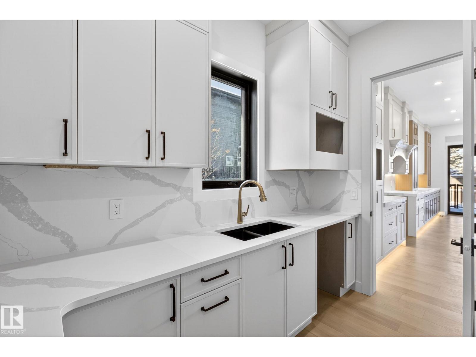 1926 Ainslie Link Sw, Edmonton, AB - Indoor Photo Showing Kitchen With Double Sink