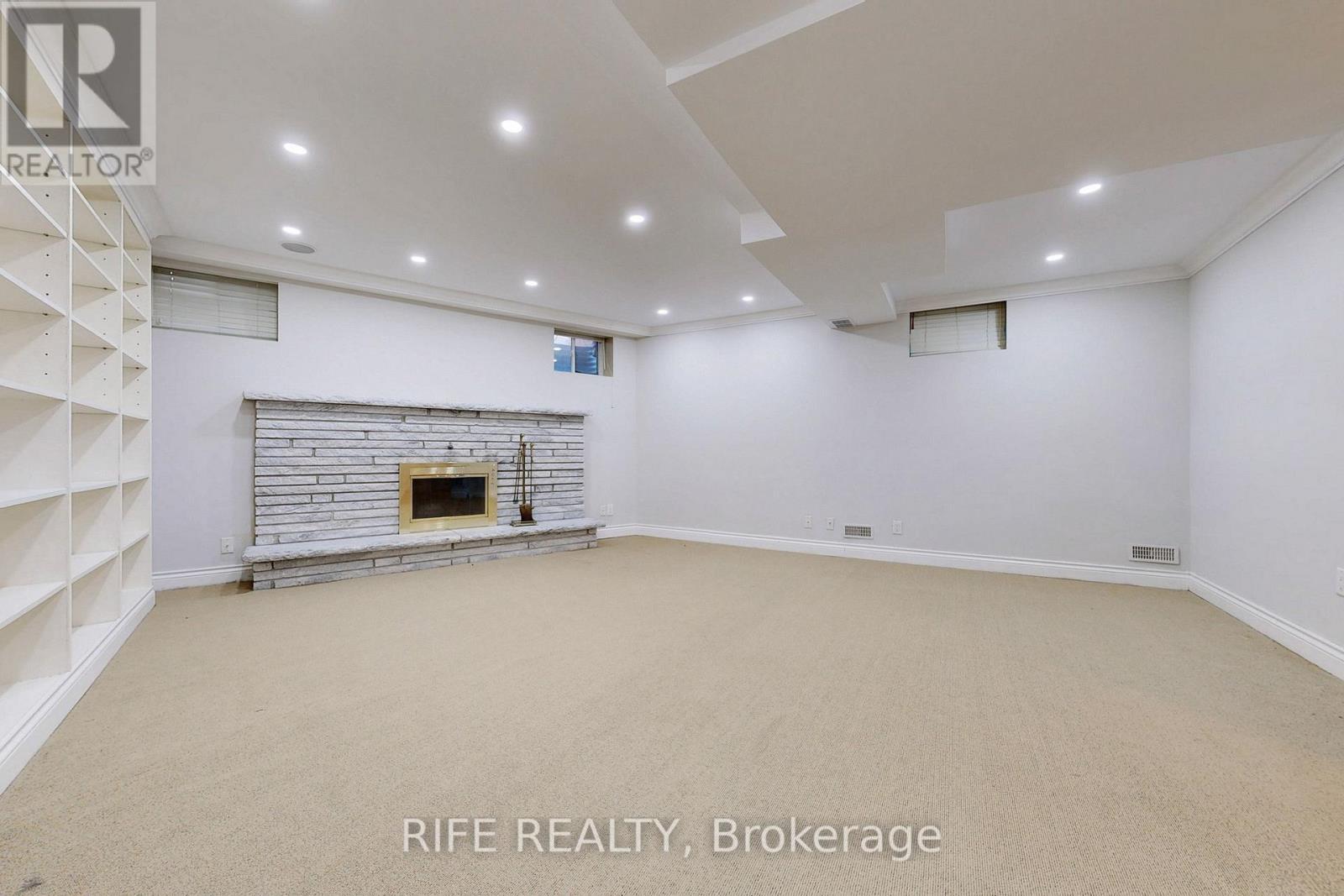 8 Elliotwood Court, Toronto, ON - Indoor With Fireplace