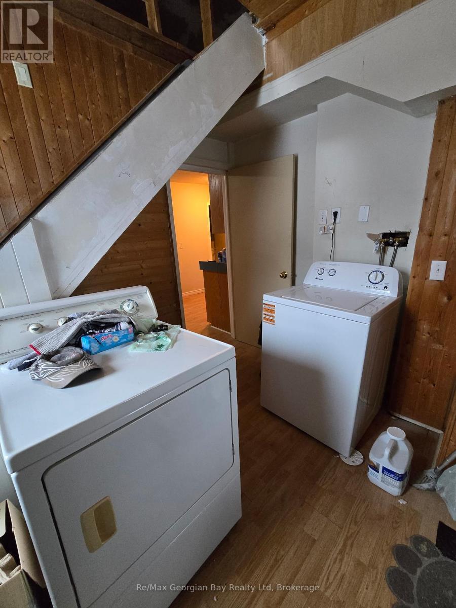 Main Floor Laundry - 8 Mill Street, Severn (Coldwater), ON - Indoor Photo Showing Laundry Room