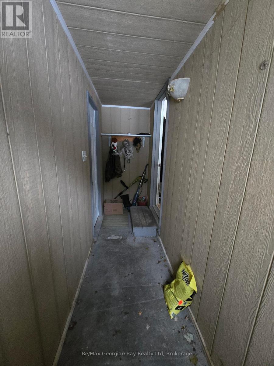 Foyer Mud Room - 8 Mill Street, Severn (Coldwater), ON - With Exterior