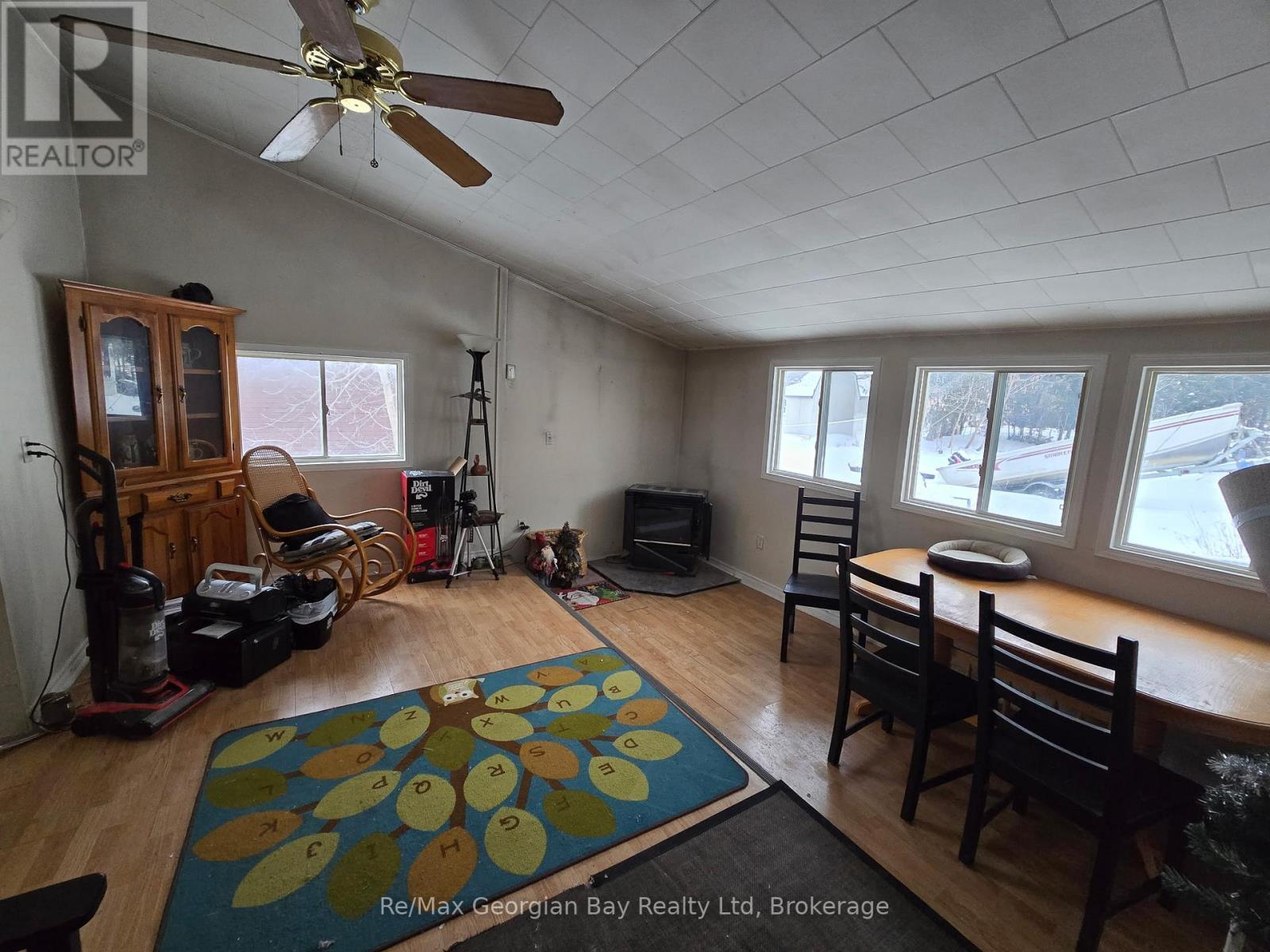 Den - 8 Mill Street, Severn (Coldwater), ON - Indoor With Fireplace