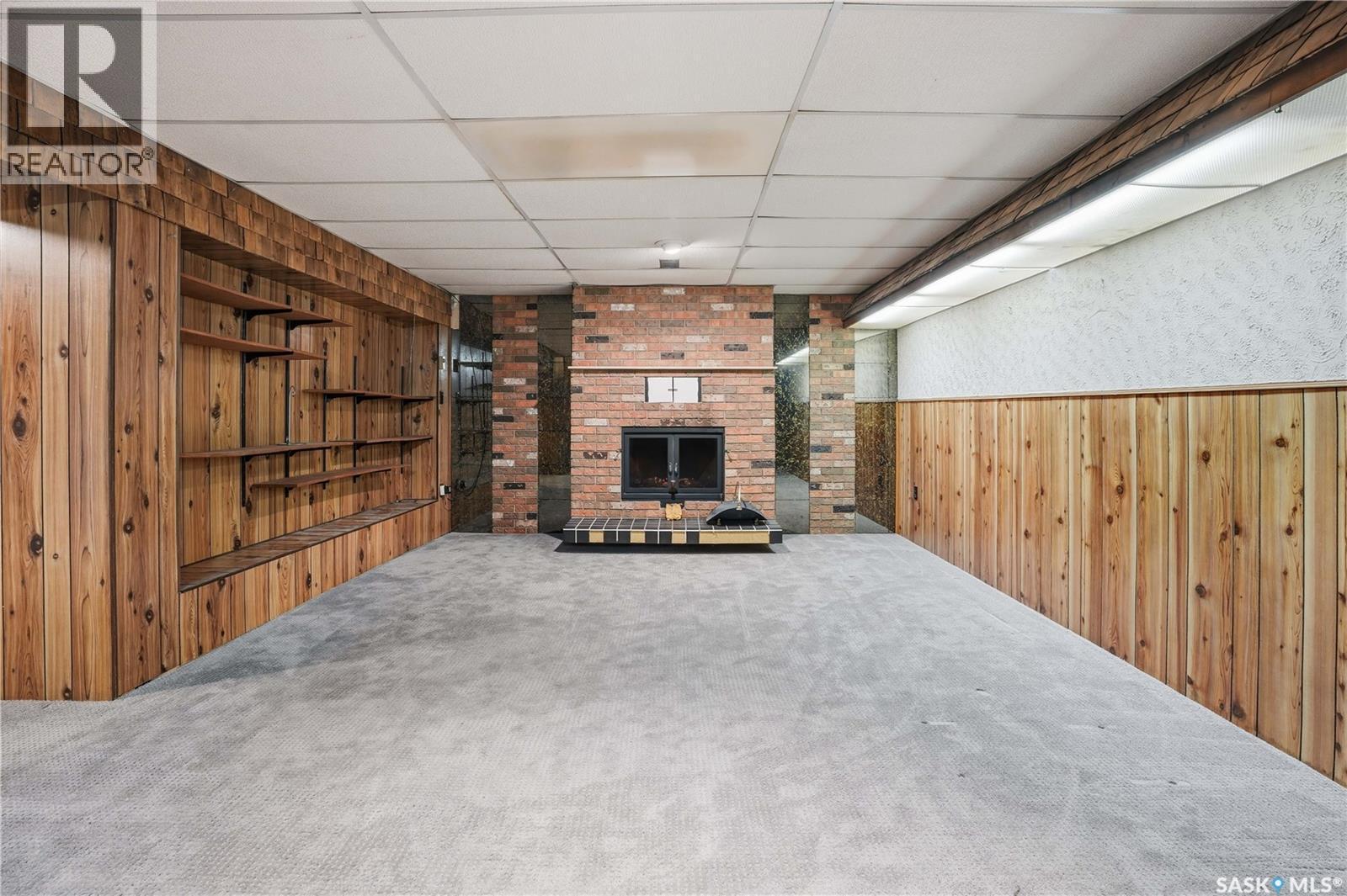 30 Cushing Crescent, Regina, SK - Indoor Photo Showing Other Room With Fireplace