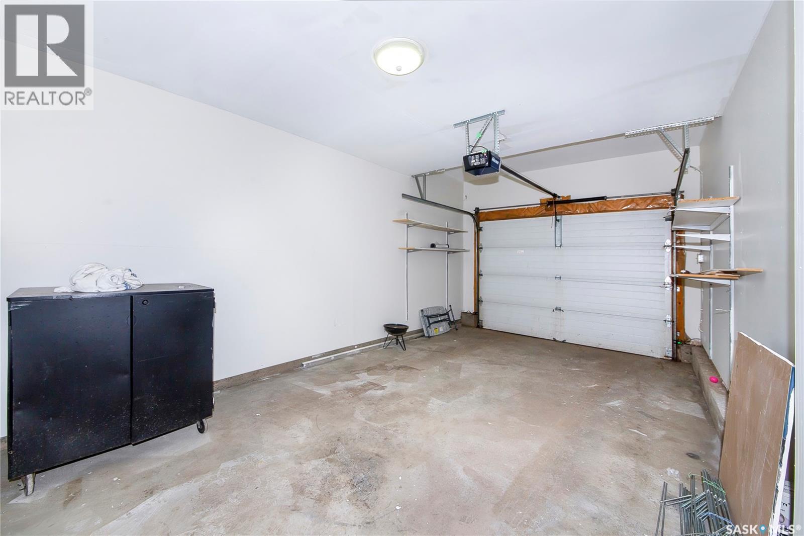 28 215 Pinehouse Drive, Saskatoon, SK - Indoor Photo Showing Garage
