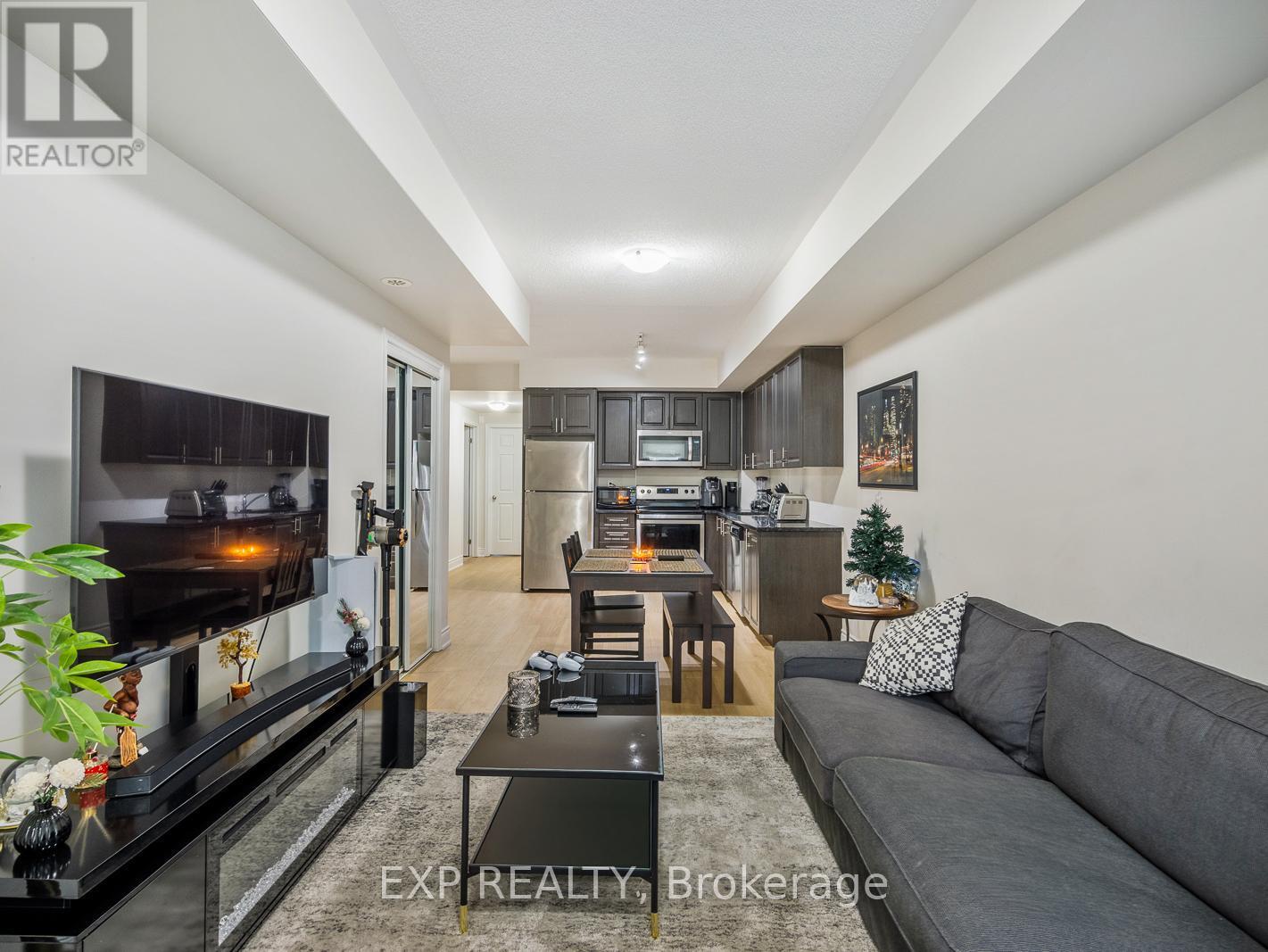 101 - 8825 Sheppard Avenue E, Toronto, ON - Indoor Photo Showing Living Room