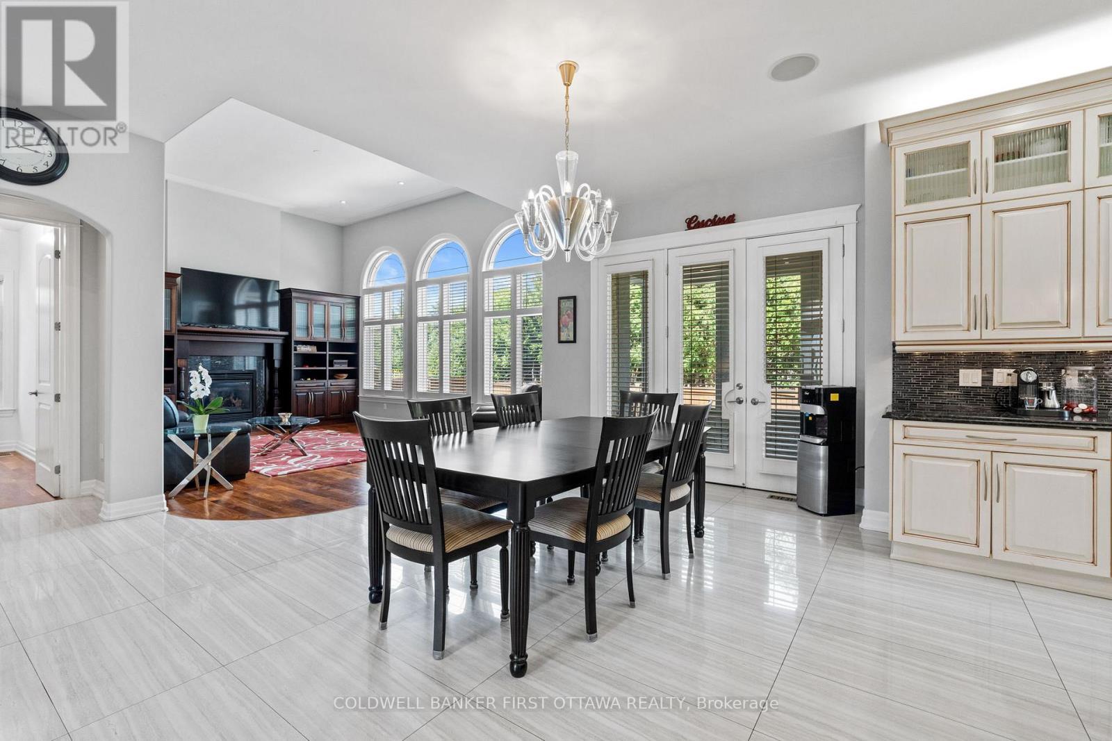 Office nook and french door walkout to the lanii. - 1623 Claymor Avenue, Ottawa, ON - Indoor Photo Showing Dining Room