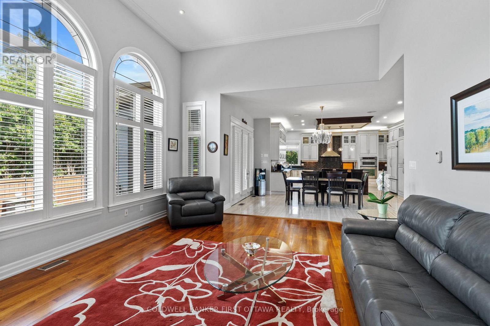 Great room w gas fireplace & hardwood floors. - 1623 Claymor Avenue, Ottawa, ON - Indoor Photo Showing Living Room